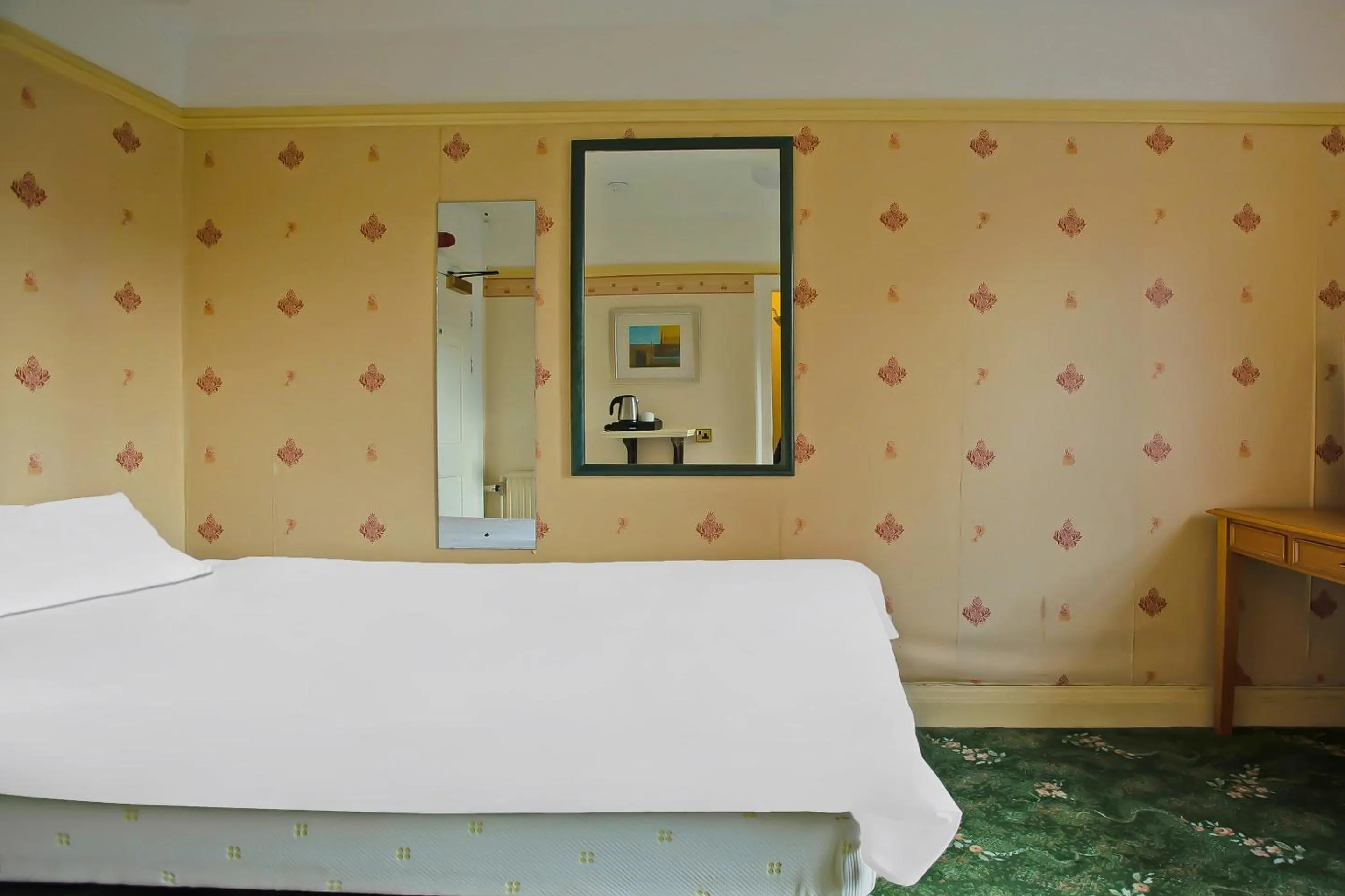 Bedroom in Great White Horse Hotel