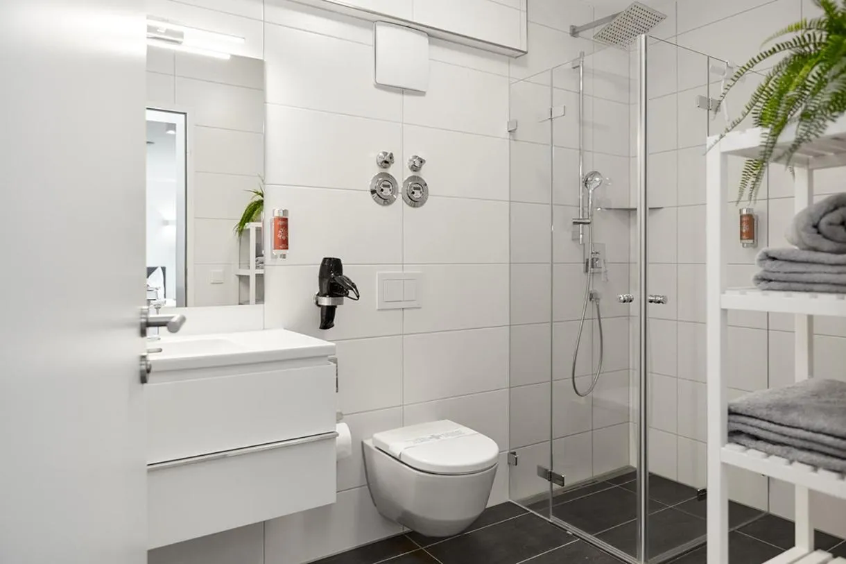 Shower in SERVENTO Boardinghouse