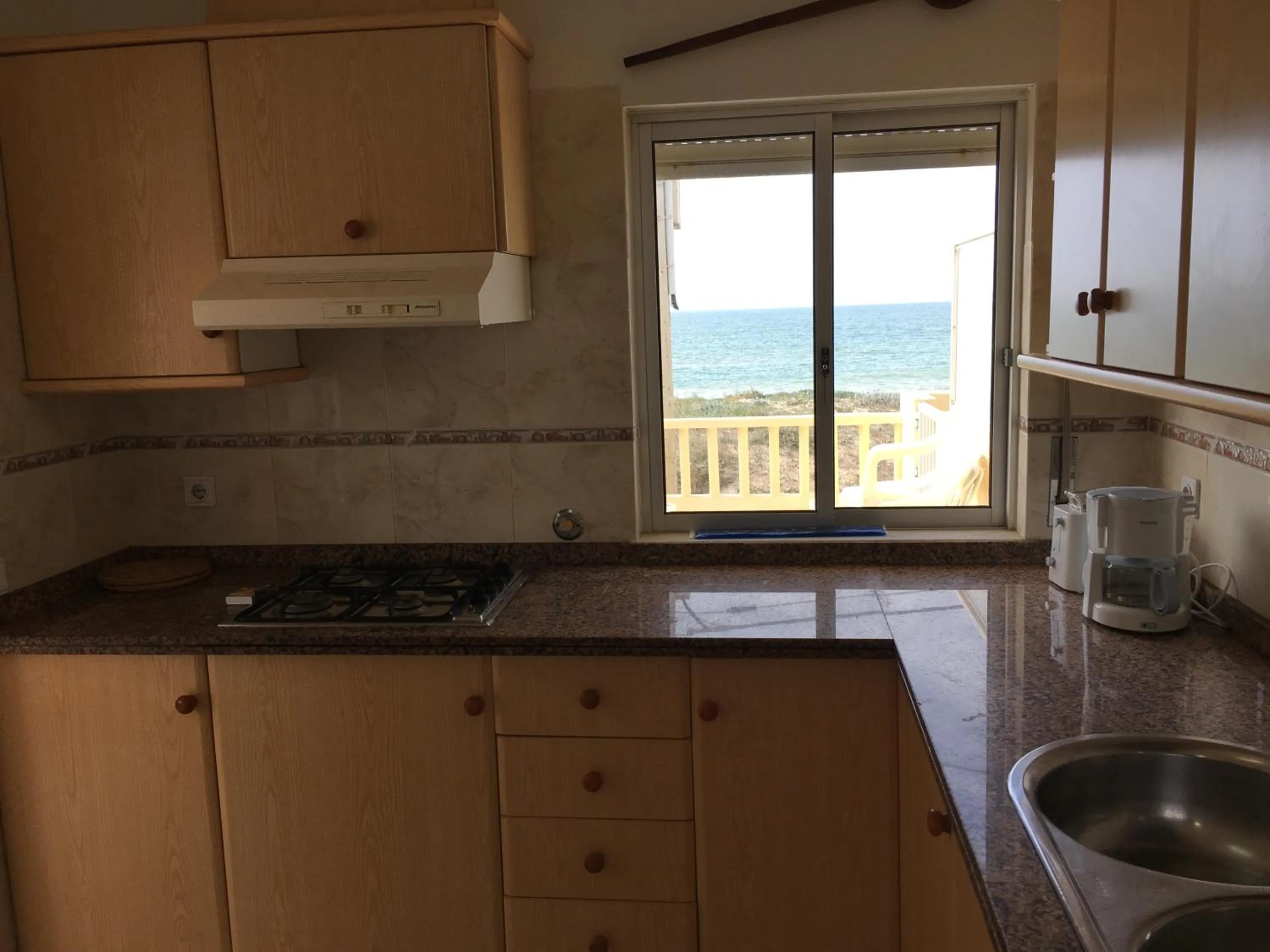 Kitchen or kitchenette in Apartamentos Barracuda