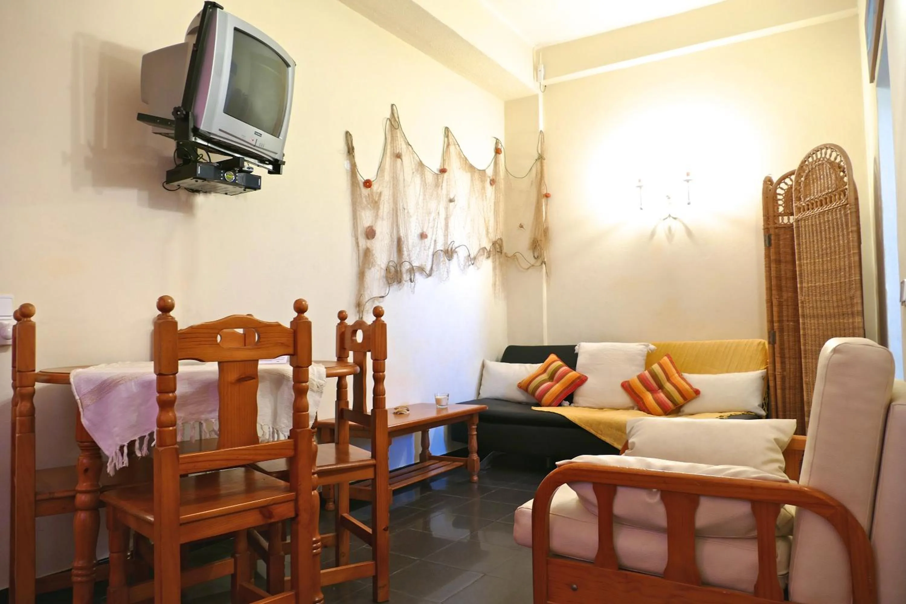 Communal lounge/ TV room in Apartamentos Barracuda