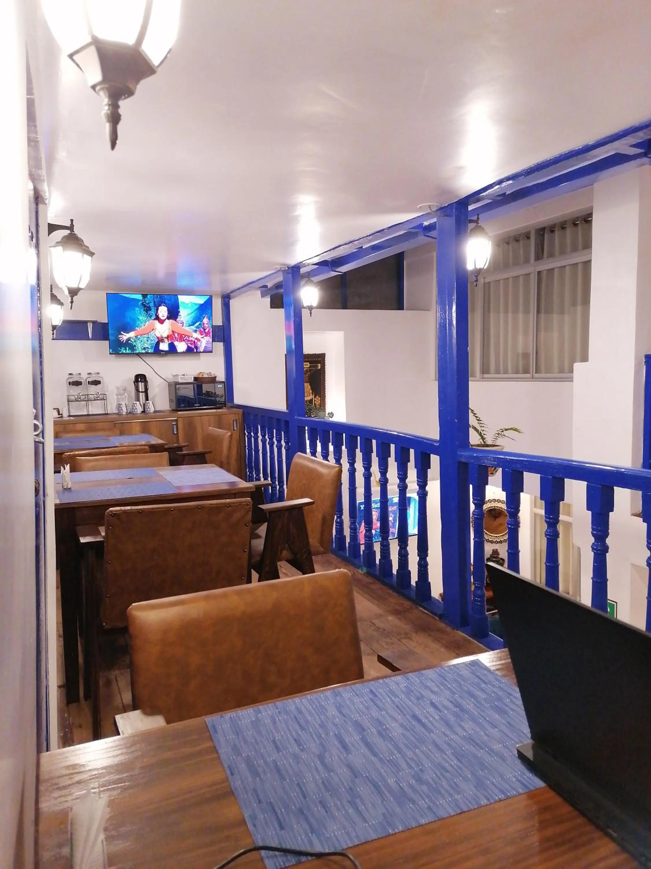 Communal lounge/ TV room in El Ave Azul Boutique Hotel Cusco