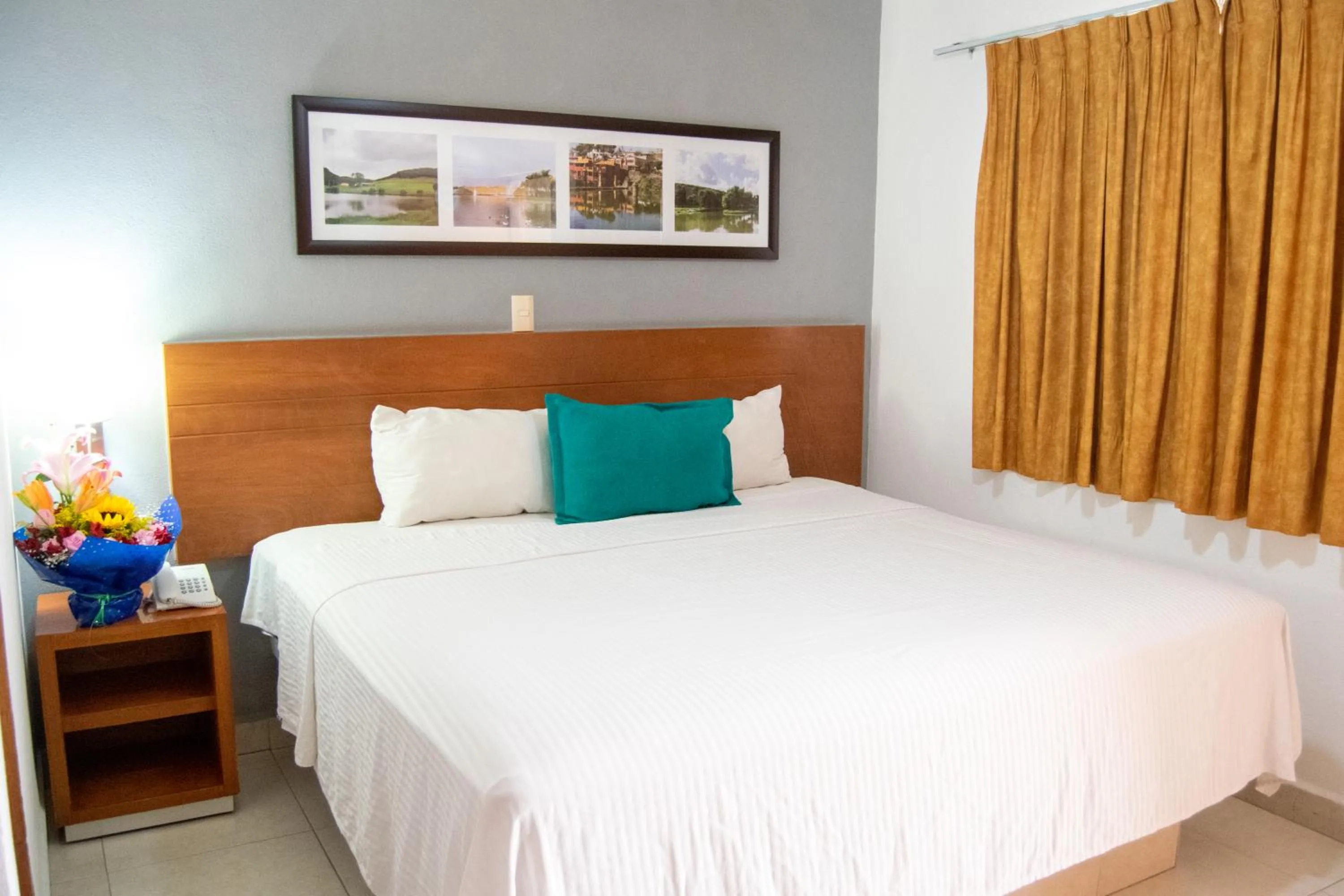 Bed in Hotel River Poliforum