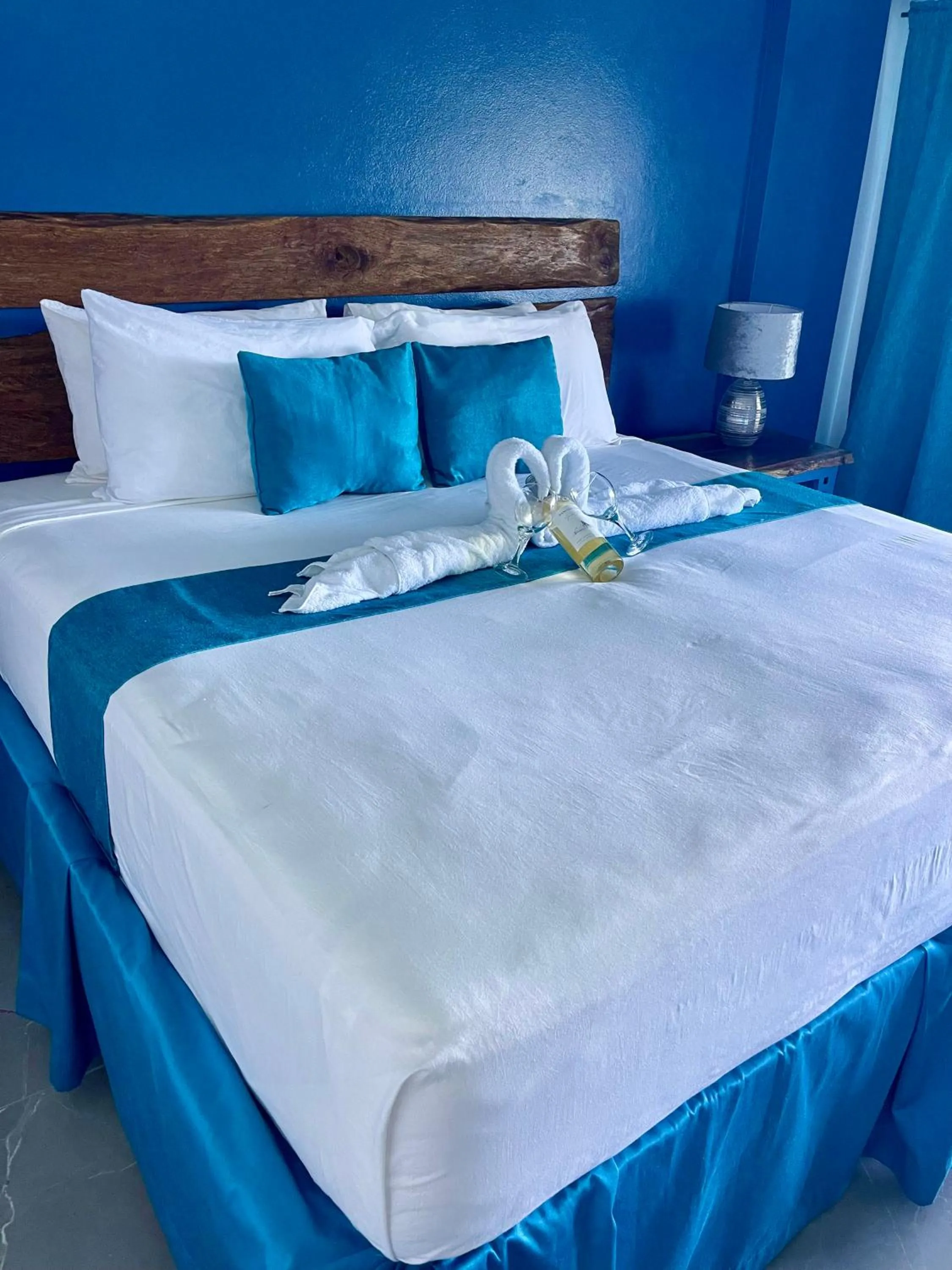 Bed in Sand and Tan Beach Hotel