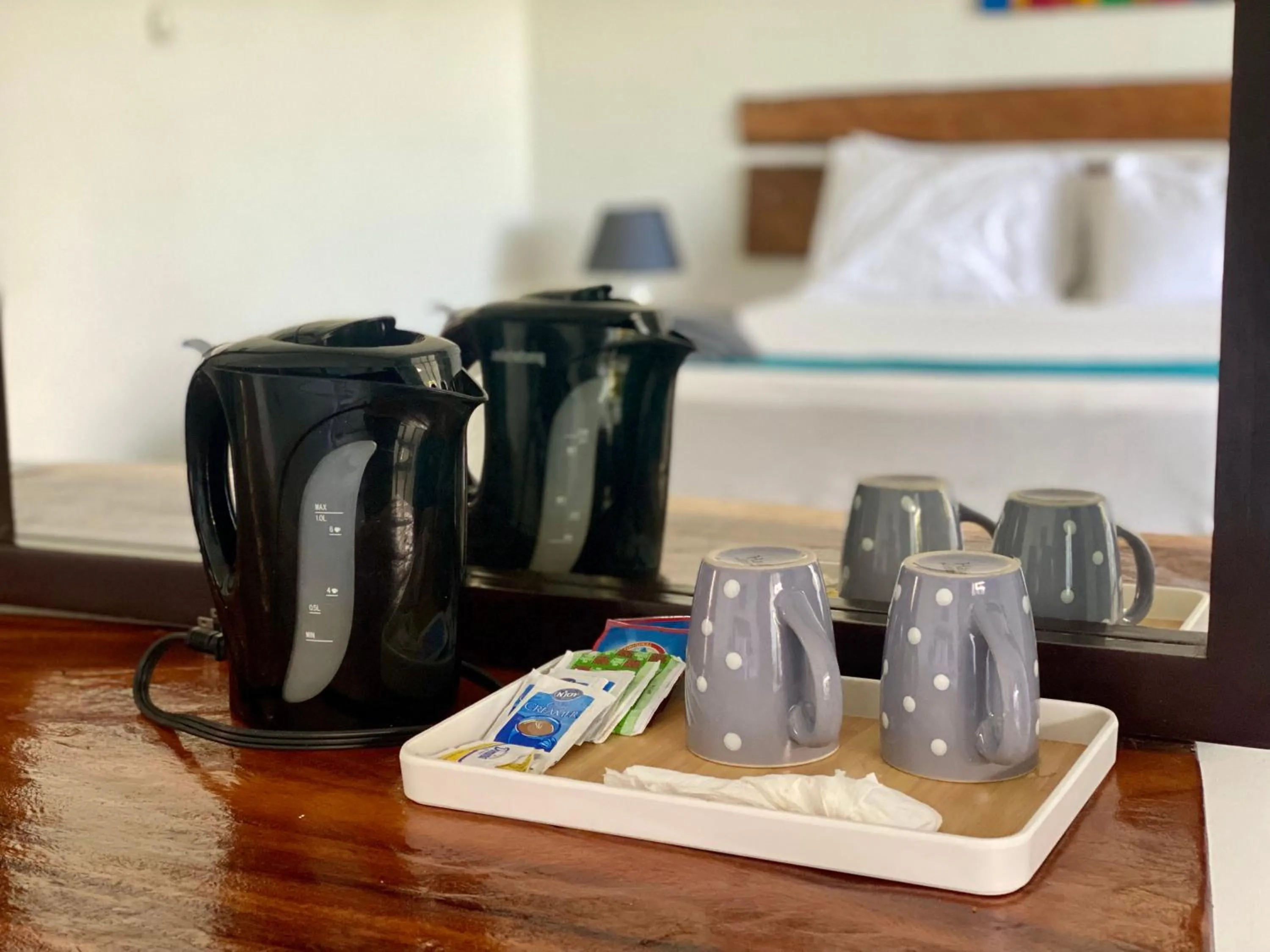 Bedroom in Sand and Tan Beach Hotel