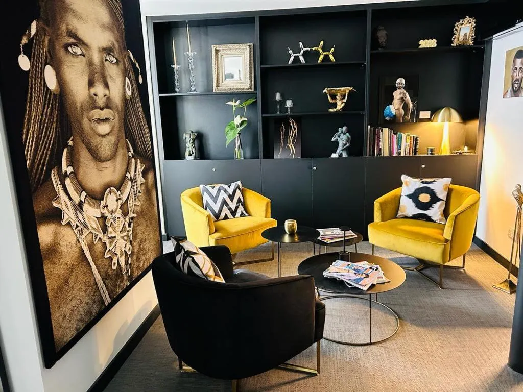 Living room in Elite Hotel - Gay Men Only