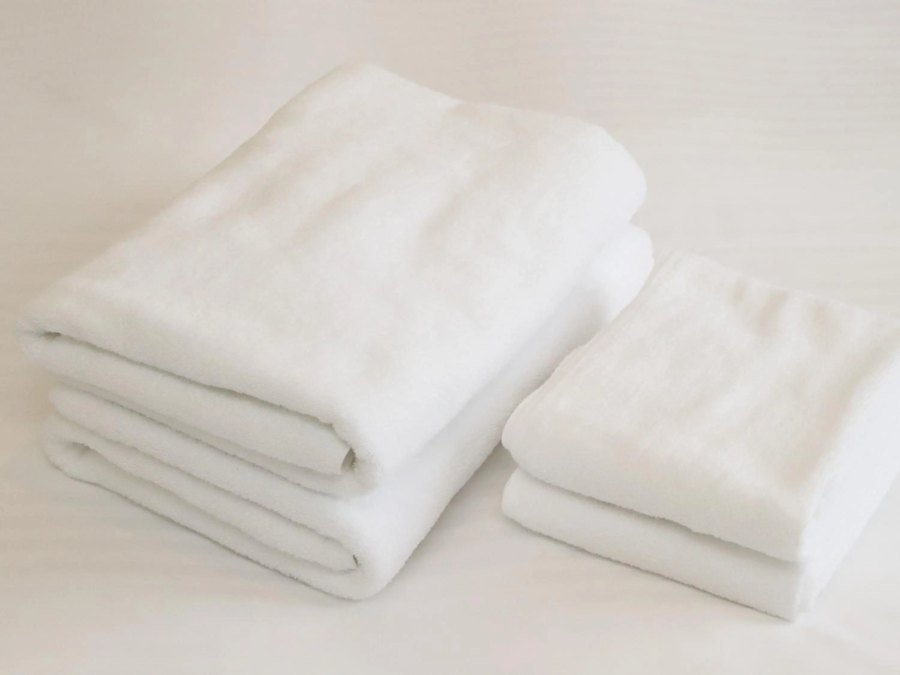 towels, Bed in Smile Hotel Shinagawa Sengakuji Ekimae