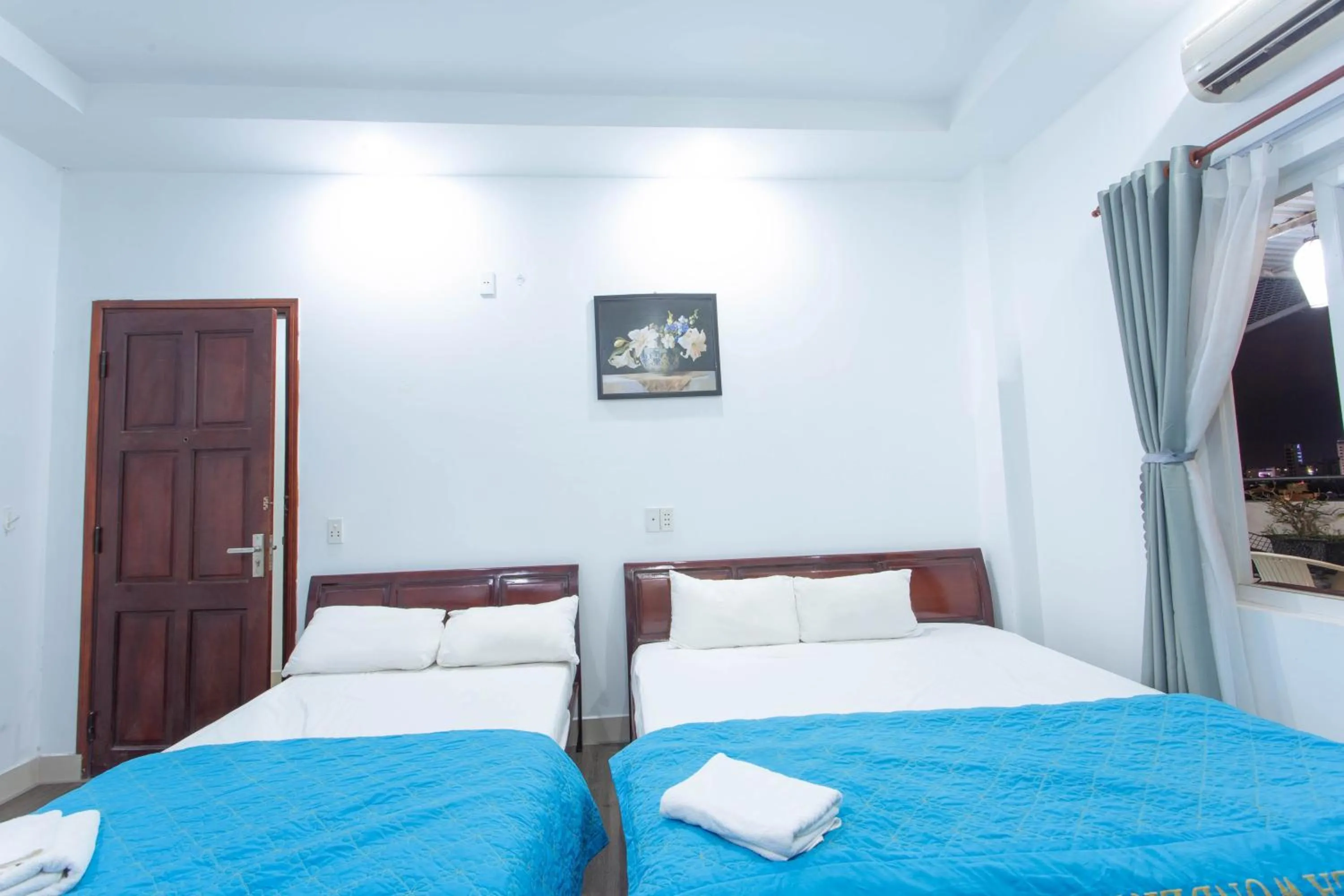 Bed in SKY APARTMENT & HOTEL