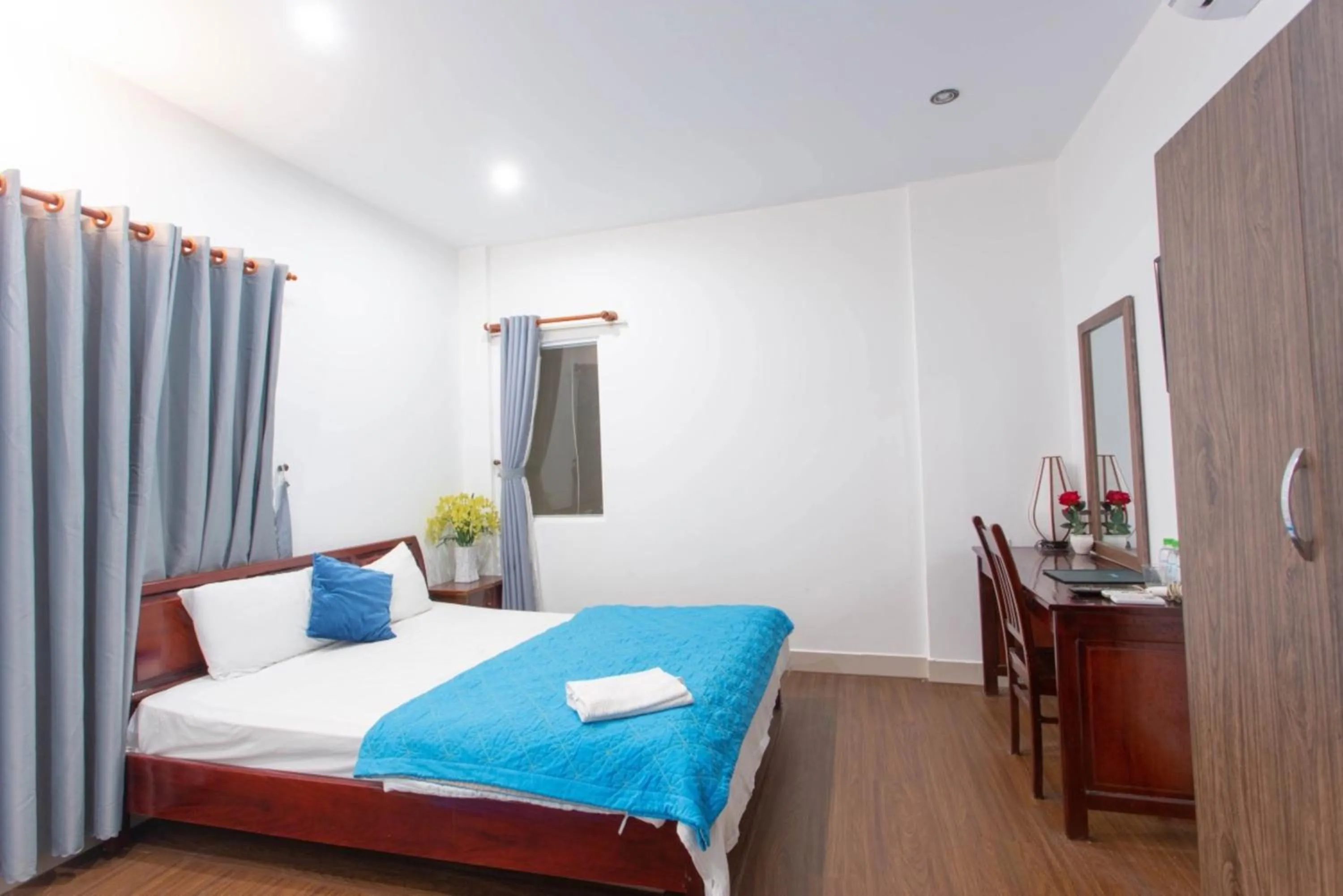 Bed in SKY APARTMENT & HOTEL