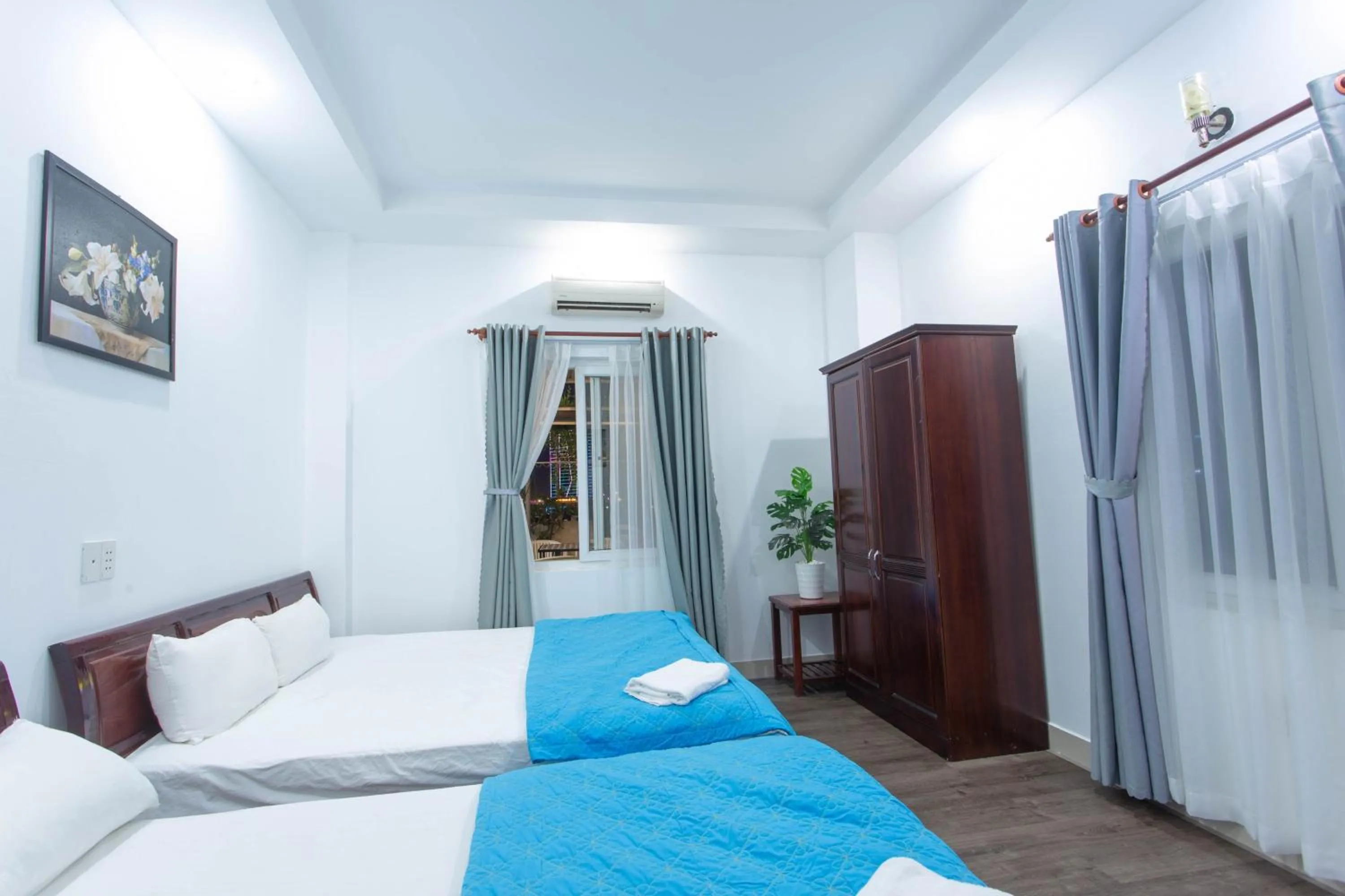 Bed in SKY APARTMENT & HOTEL