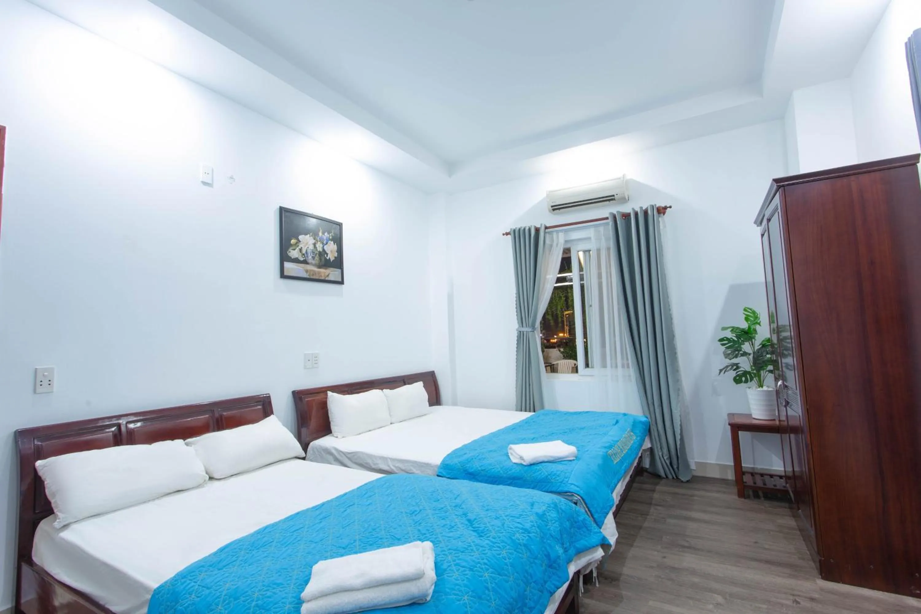 Bed in SKY APARTMENT & HOTEL