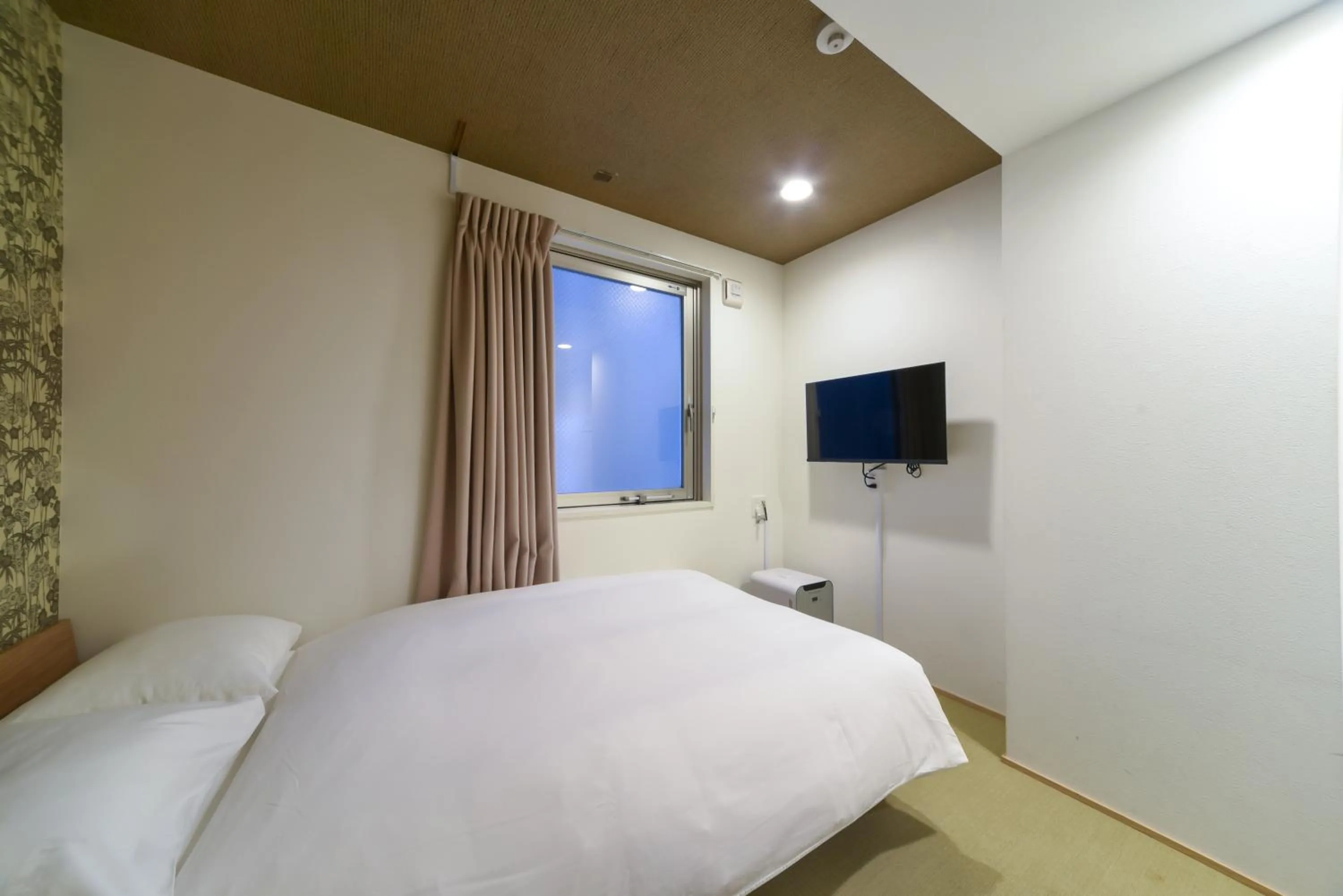 Bed in HOTEL WAN OSAKA EBISU