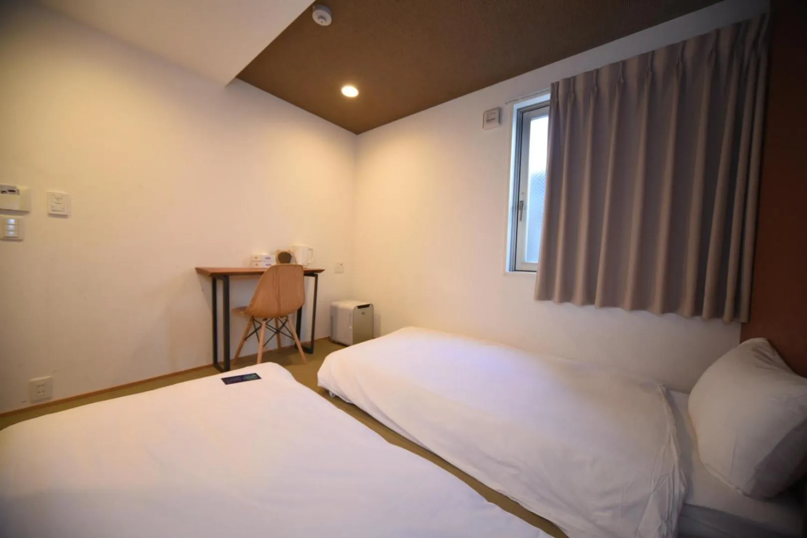 Bed in HOTEL WAN OSAKA EBISU