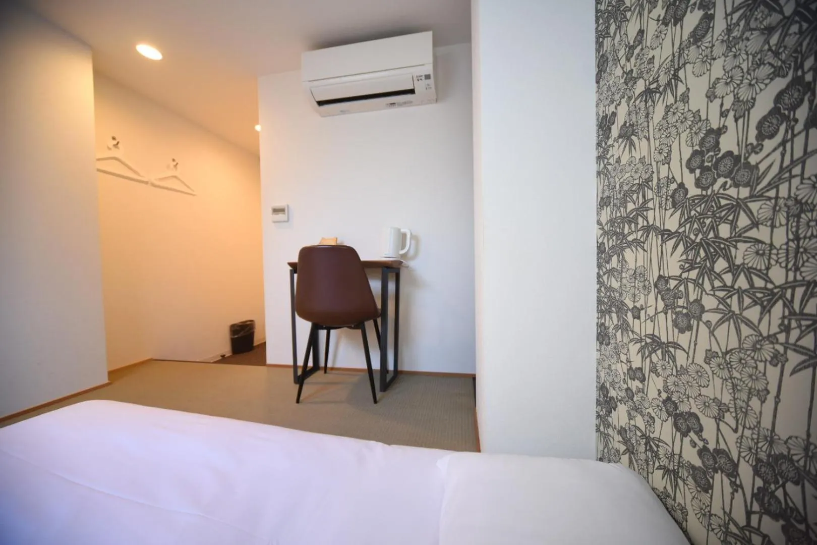 Bed in HOTEL WAN OSAKA EBISU