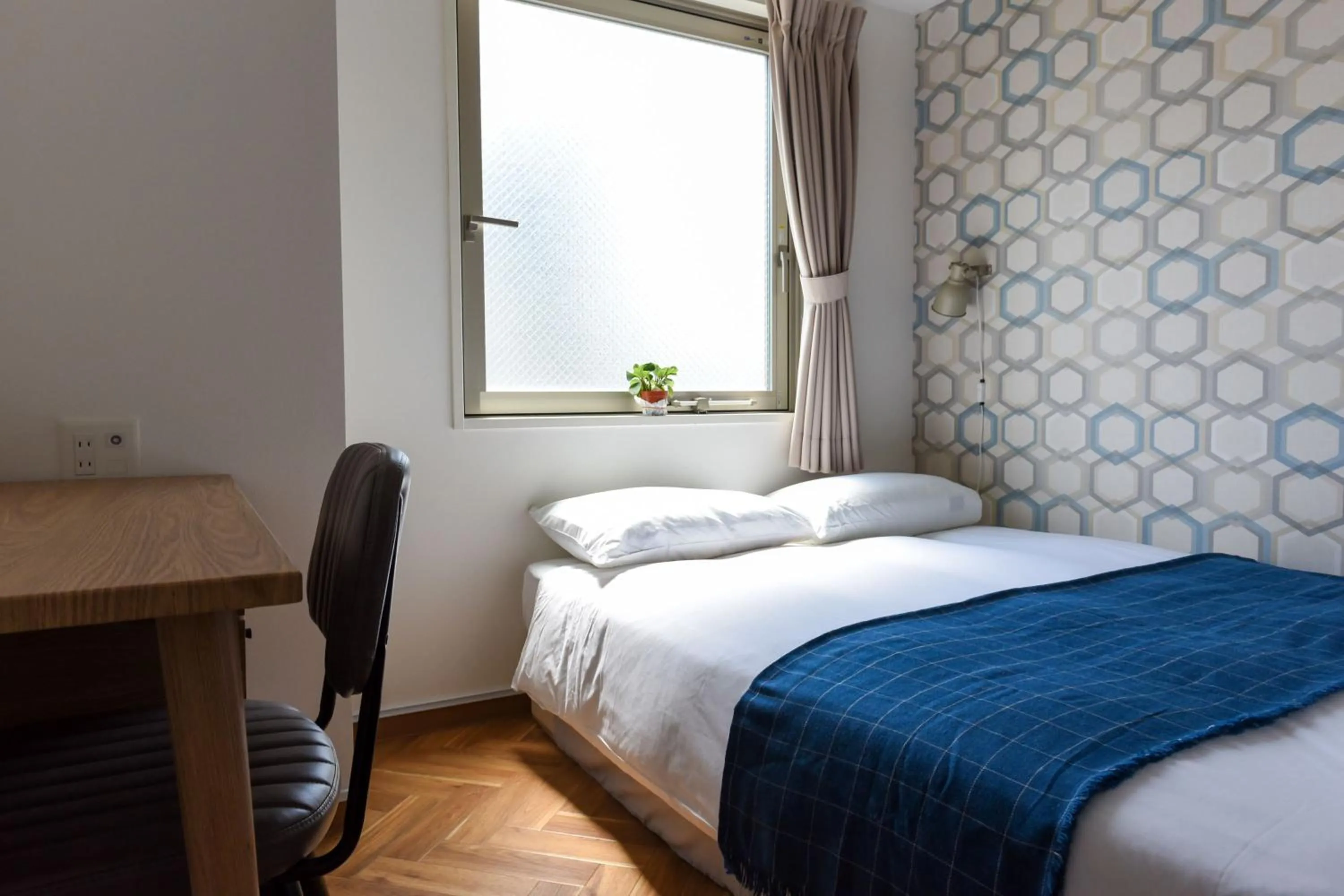 Bed in HOTEL WAN OSAKA EBISU