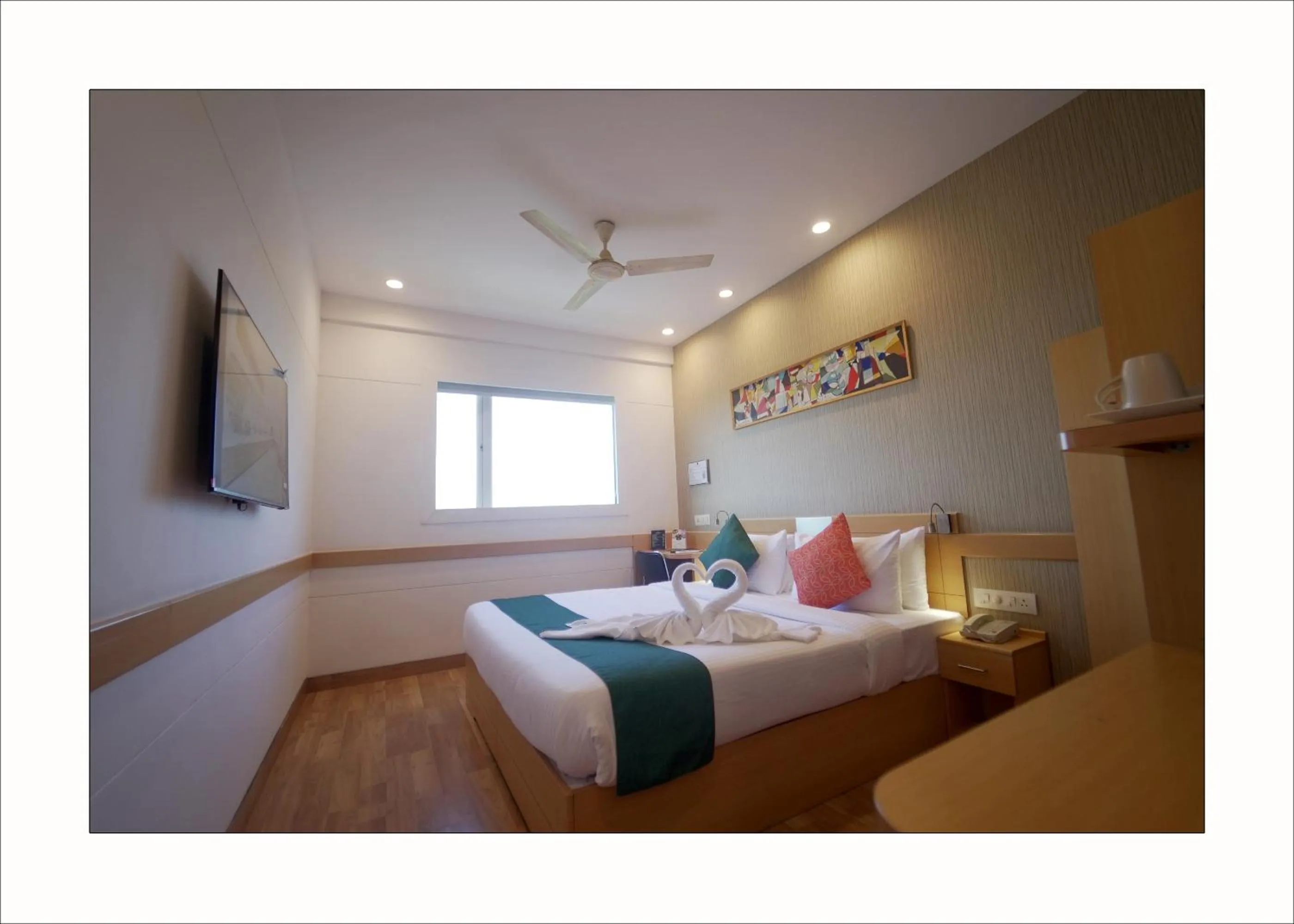 Bed in Mango Grove Hotel