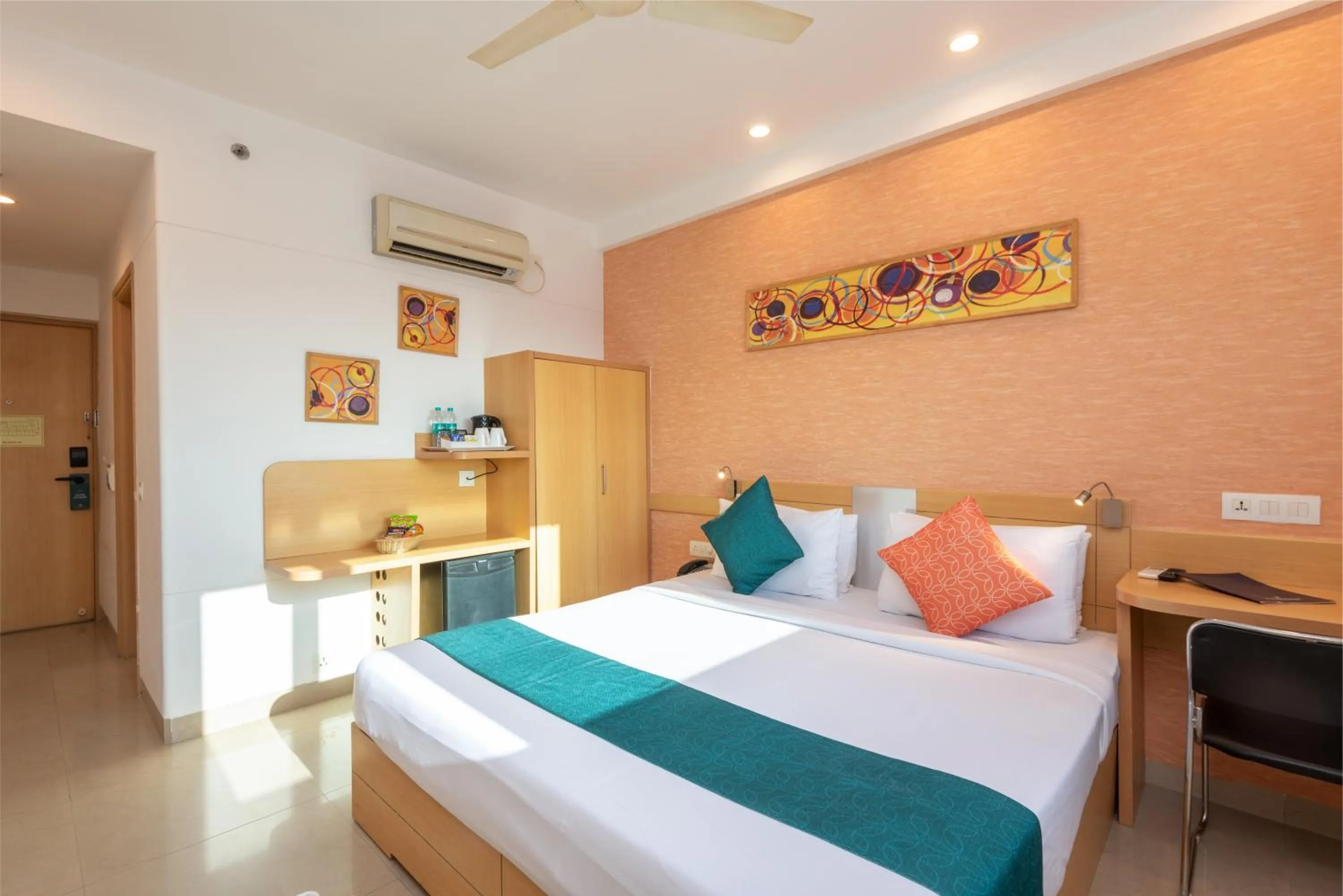 Bed in Mango Grove Hotel