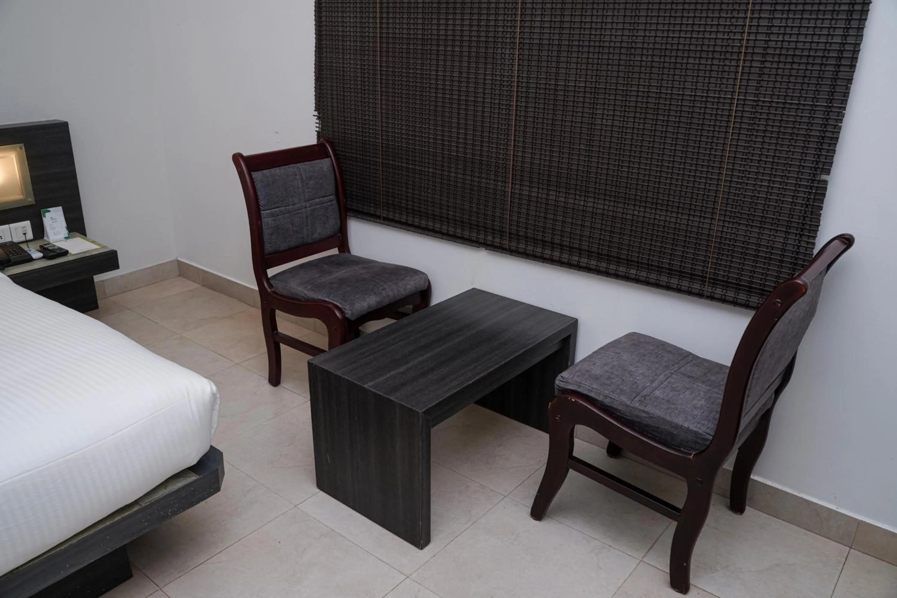 Seating area, Bed in Hotel Palm shore