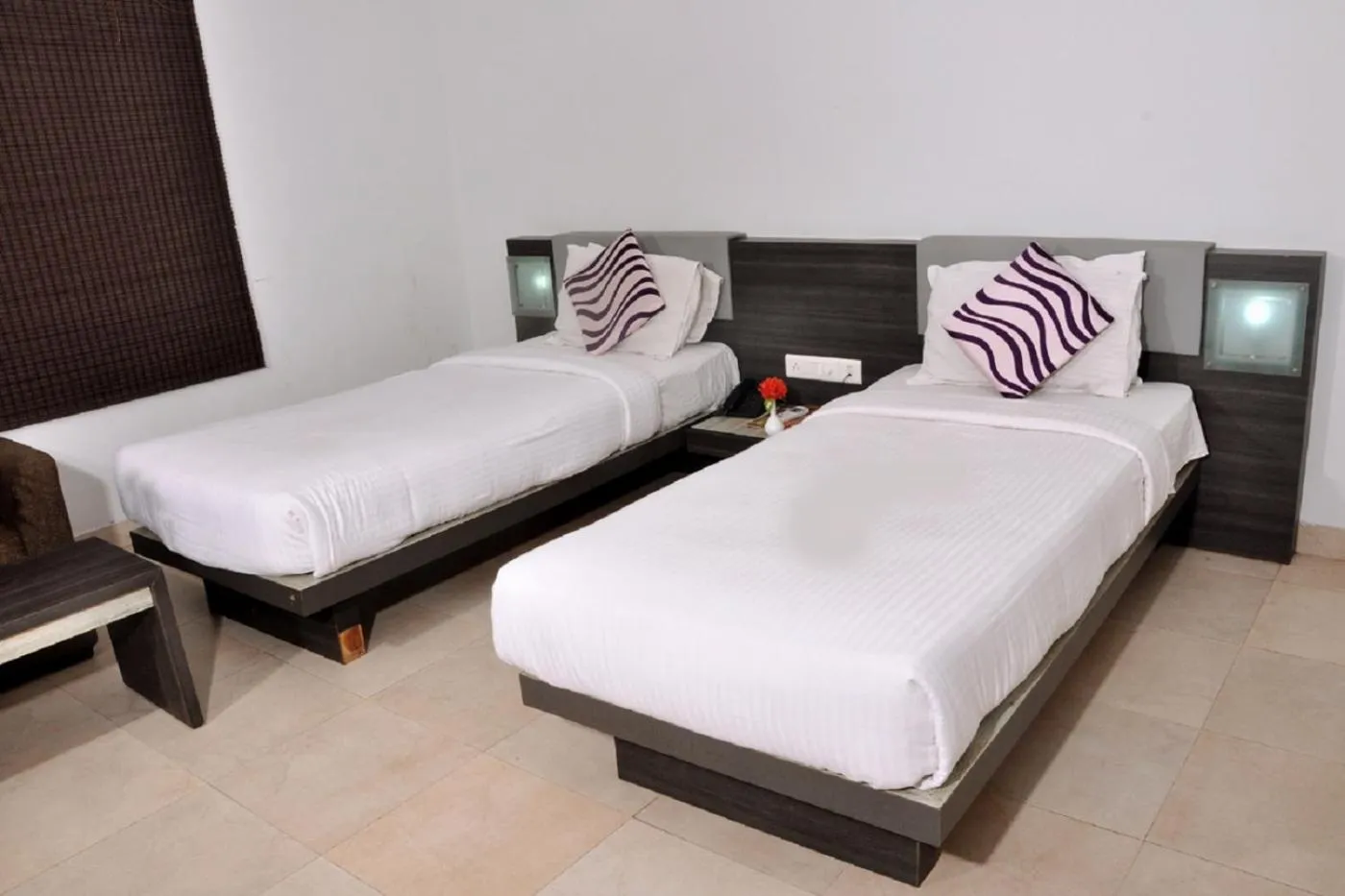 Bed in Hotel Palm shore