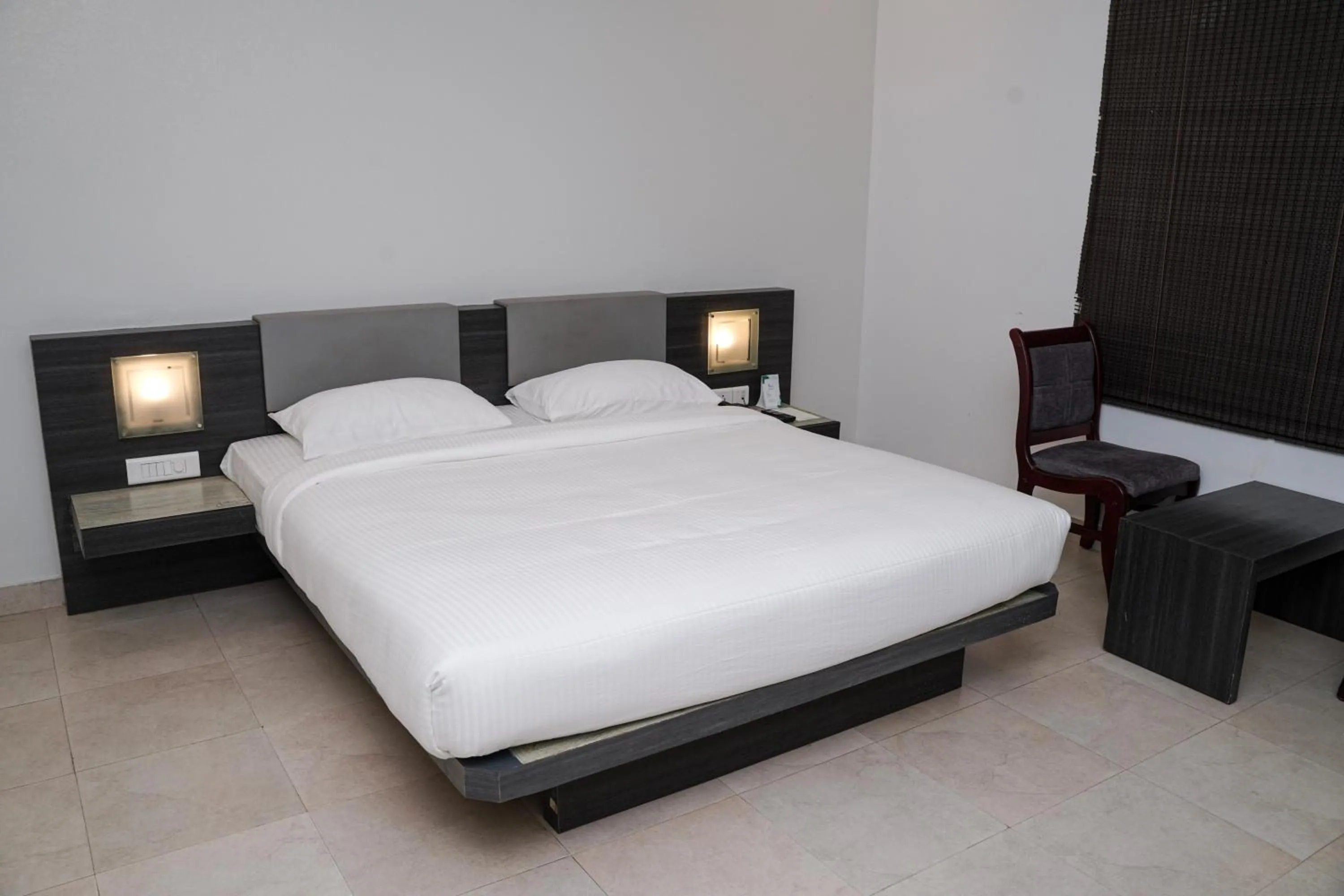 Bed in Hotel Palm shore