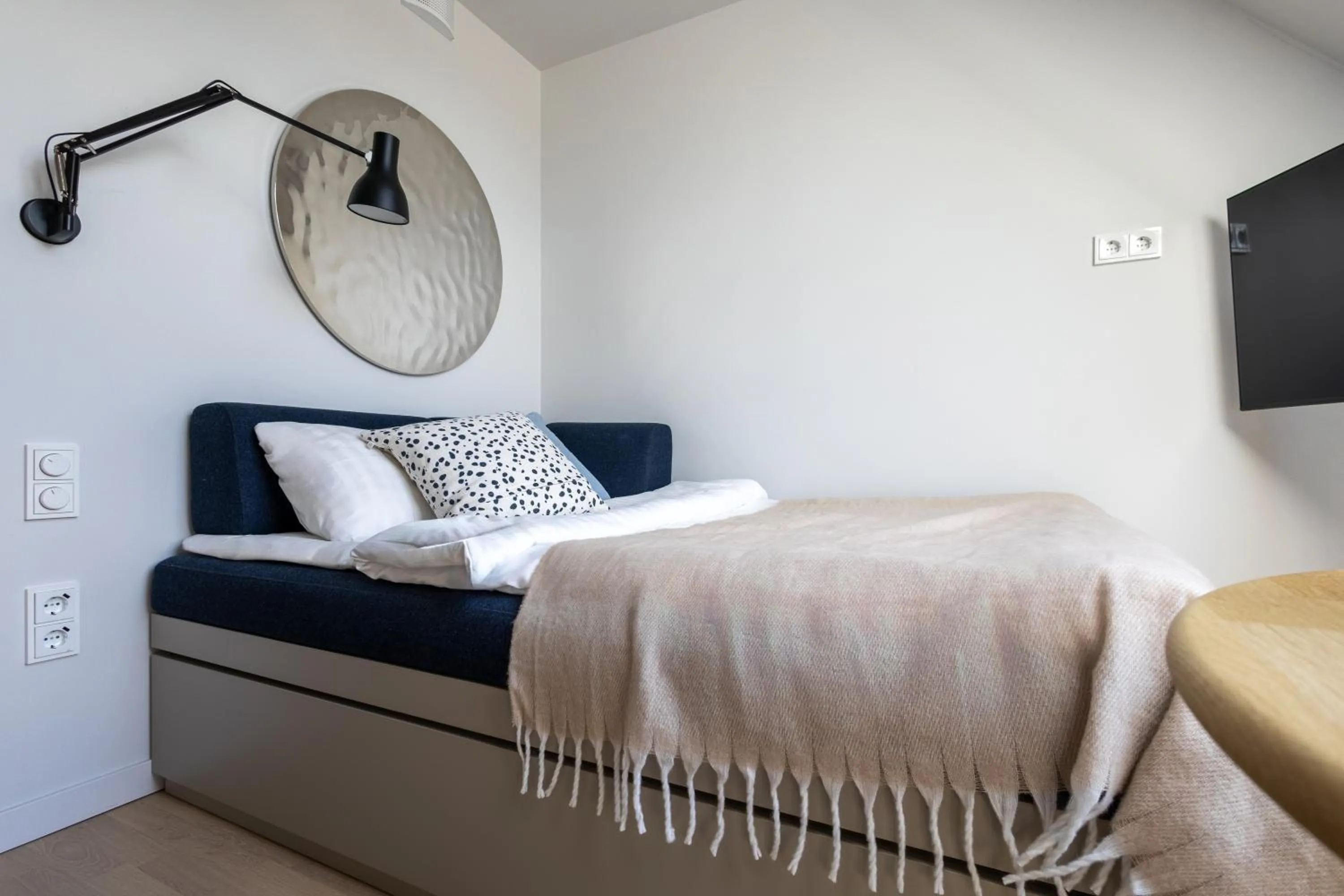 Bed in Unity Malmö - A Studio Hotel