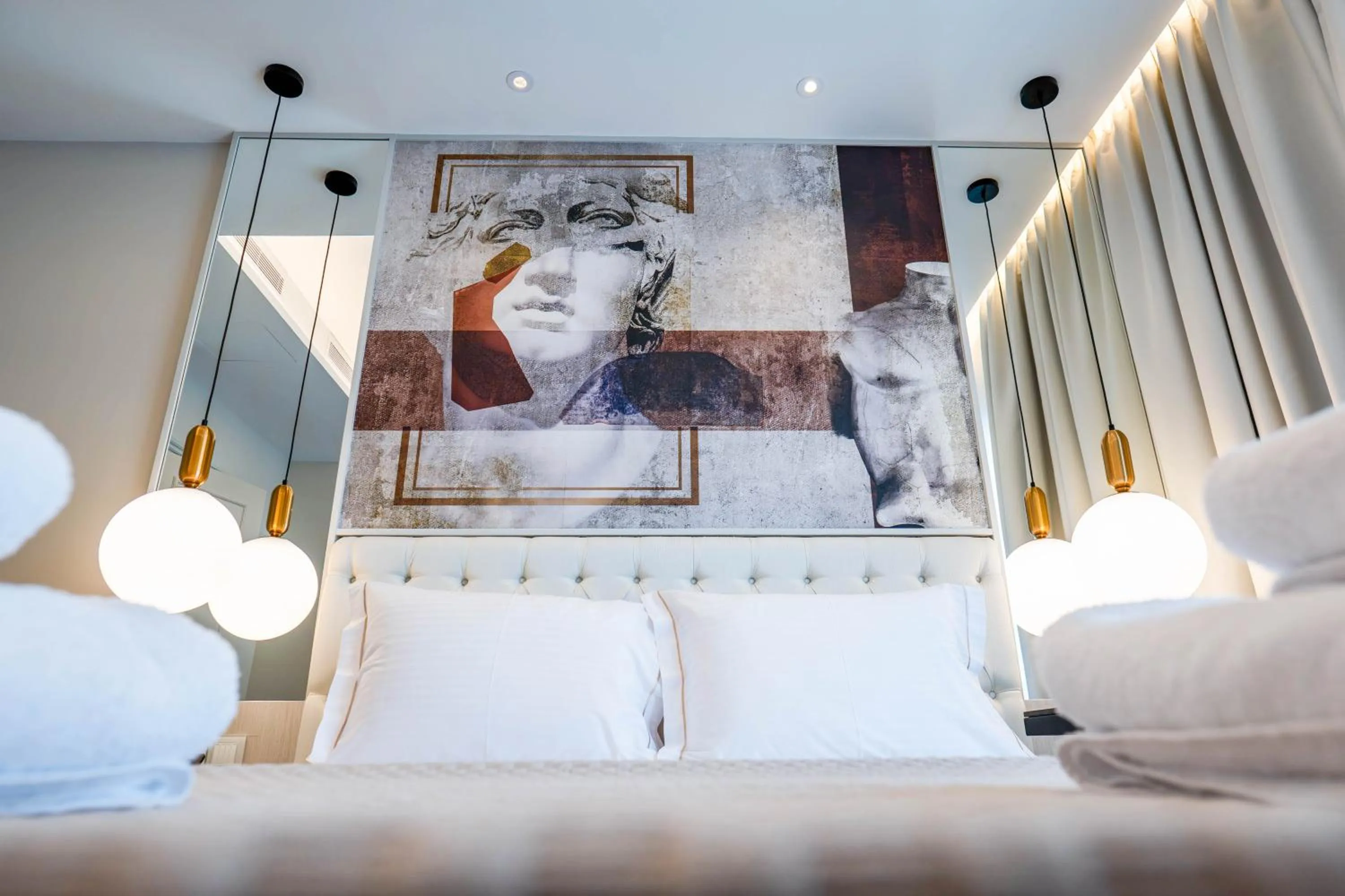 Bed in Gate Twenty Two Boutique Hotel