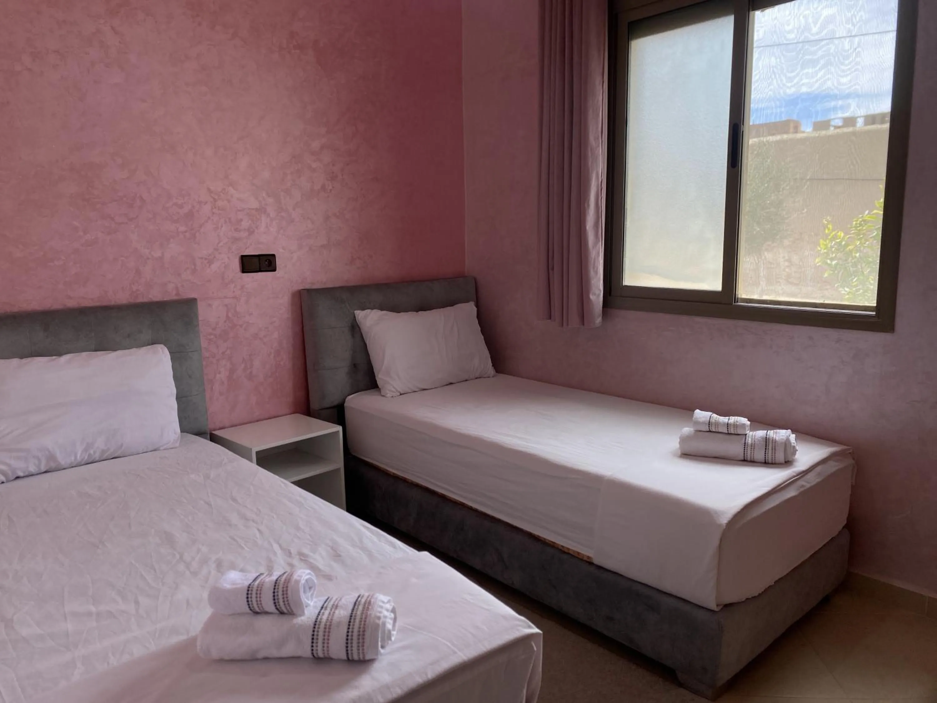 Bed in IGHIZ INN resort