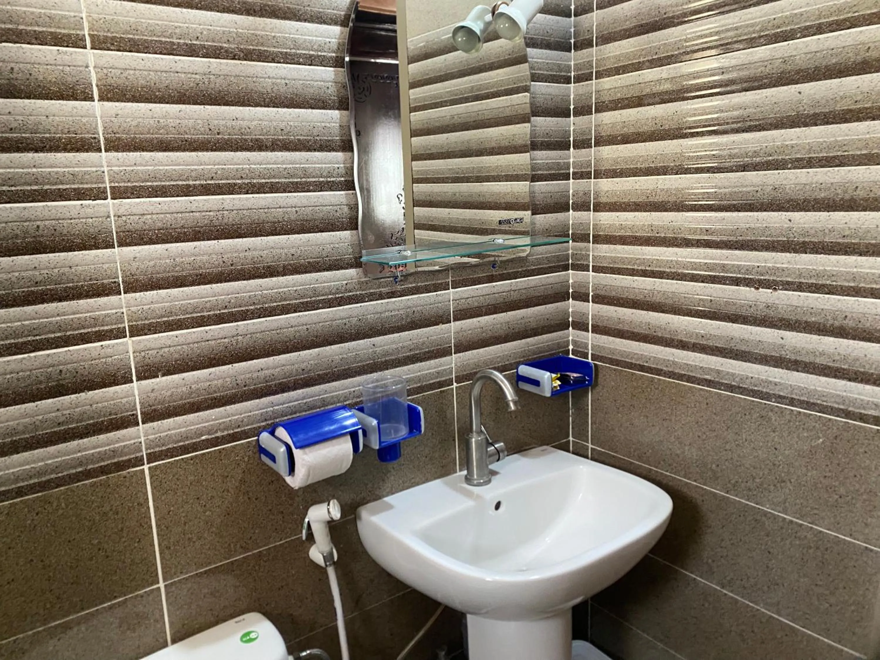 Toilet in IGHIZ INN resort