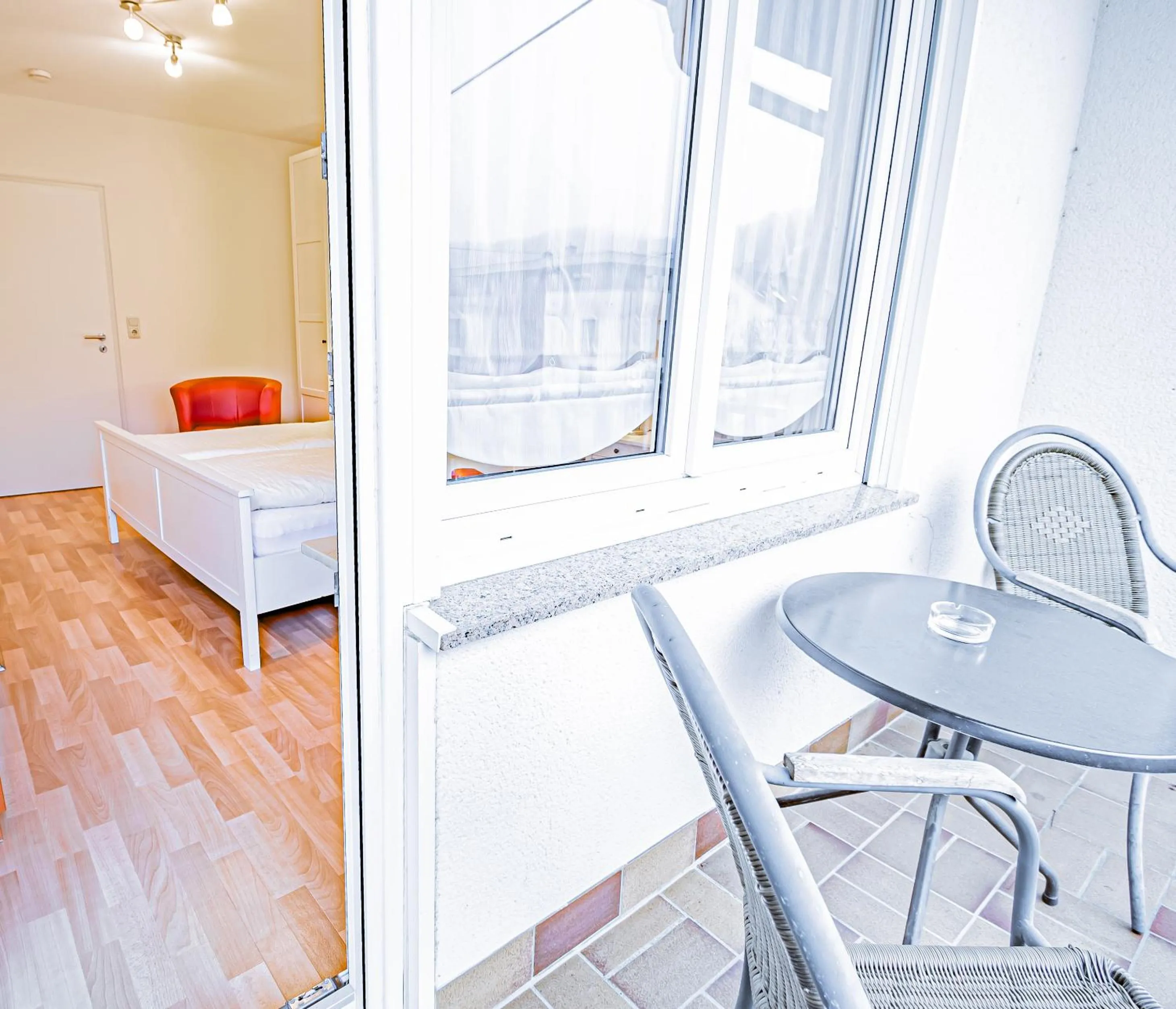 Balcony/Terrace, Bed in Johannishof Wein-Café & Gästehaus