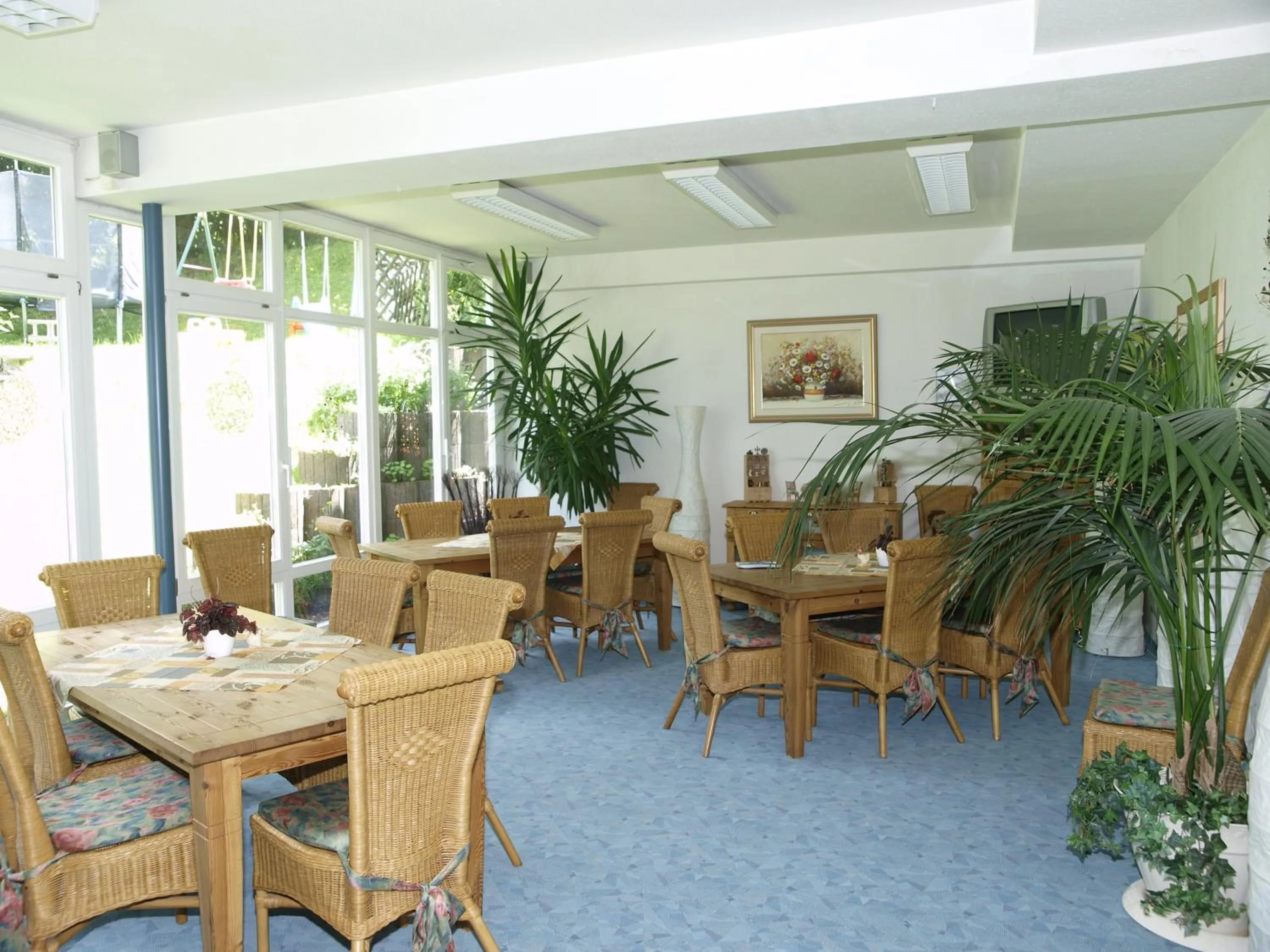 Communal lounge/ TV room in Ferienhotel Schwarzwälder Hof