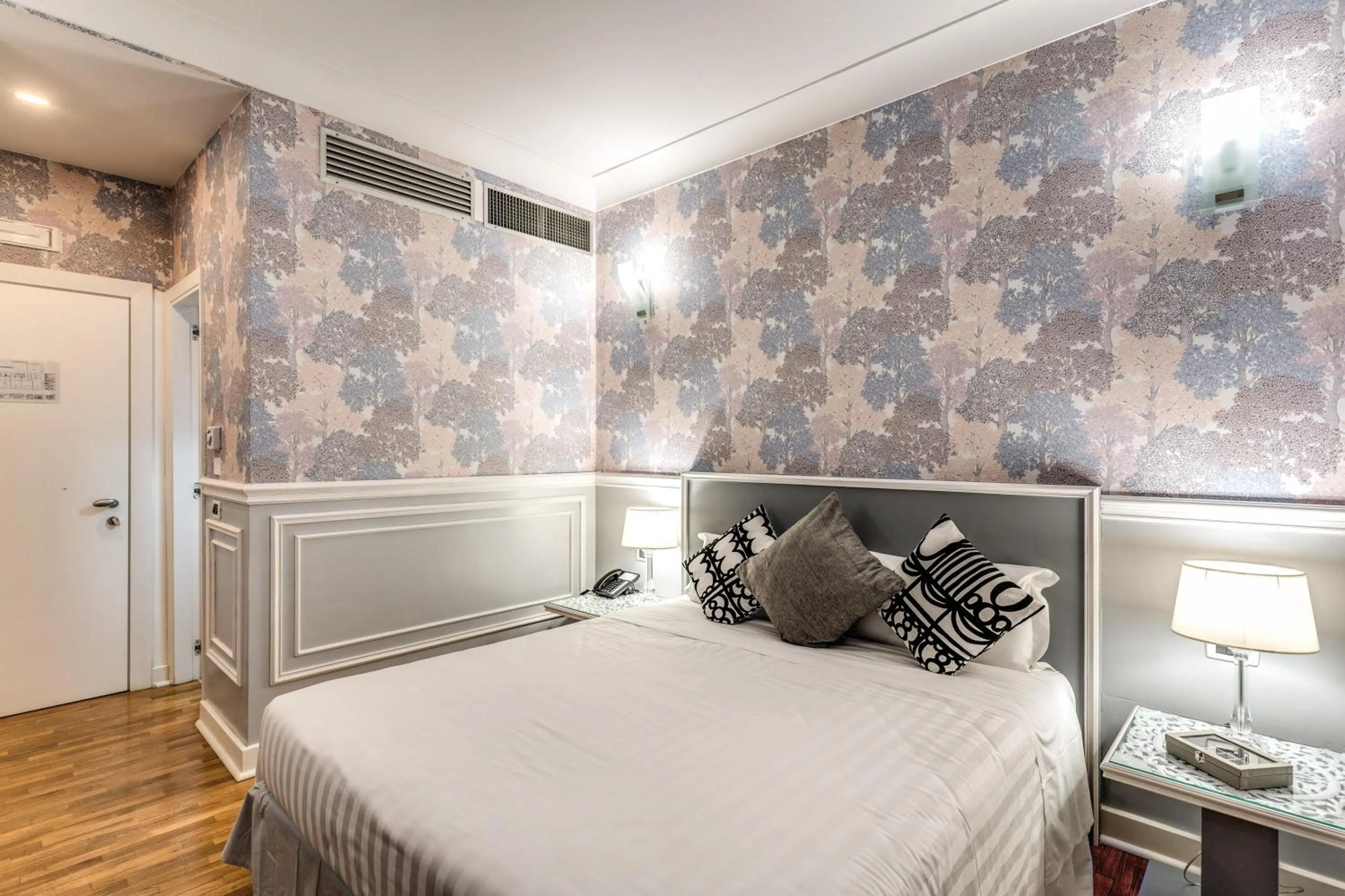 Bed in Mangili Garden Hotel