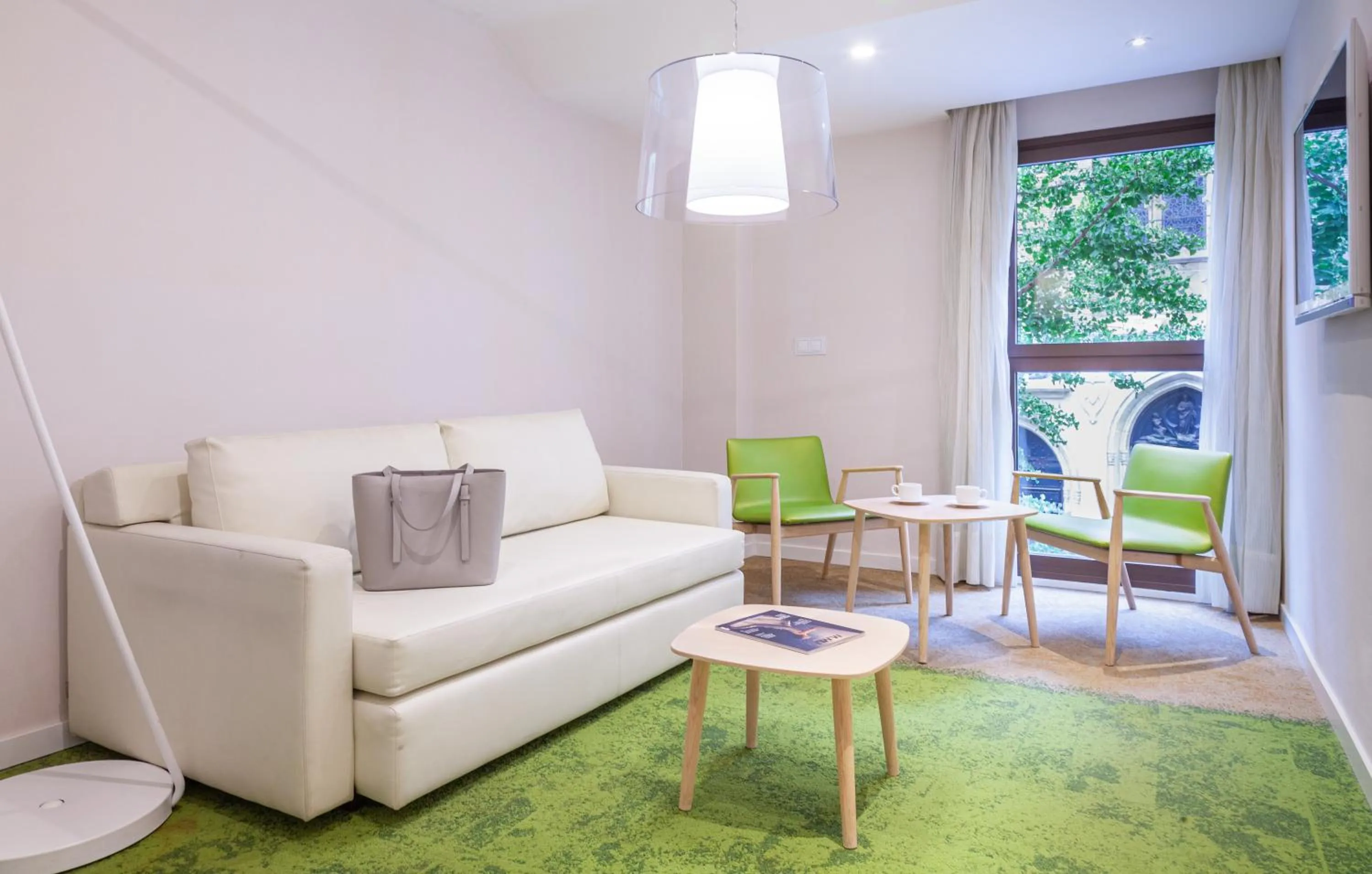 Seating area in Hotel Maciá Granada Five Senses Rooms & Suites