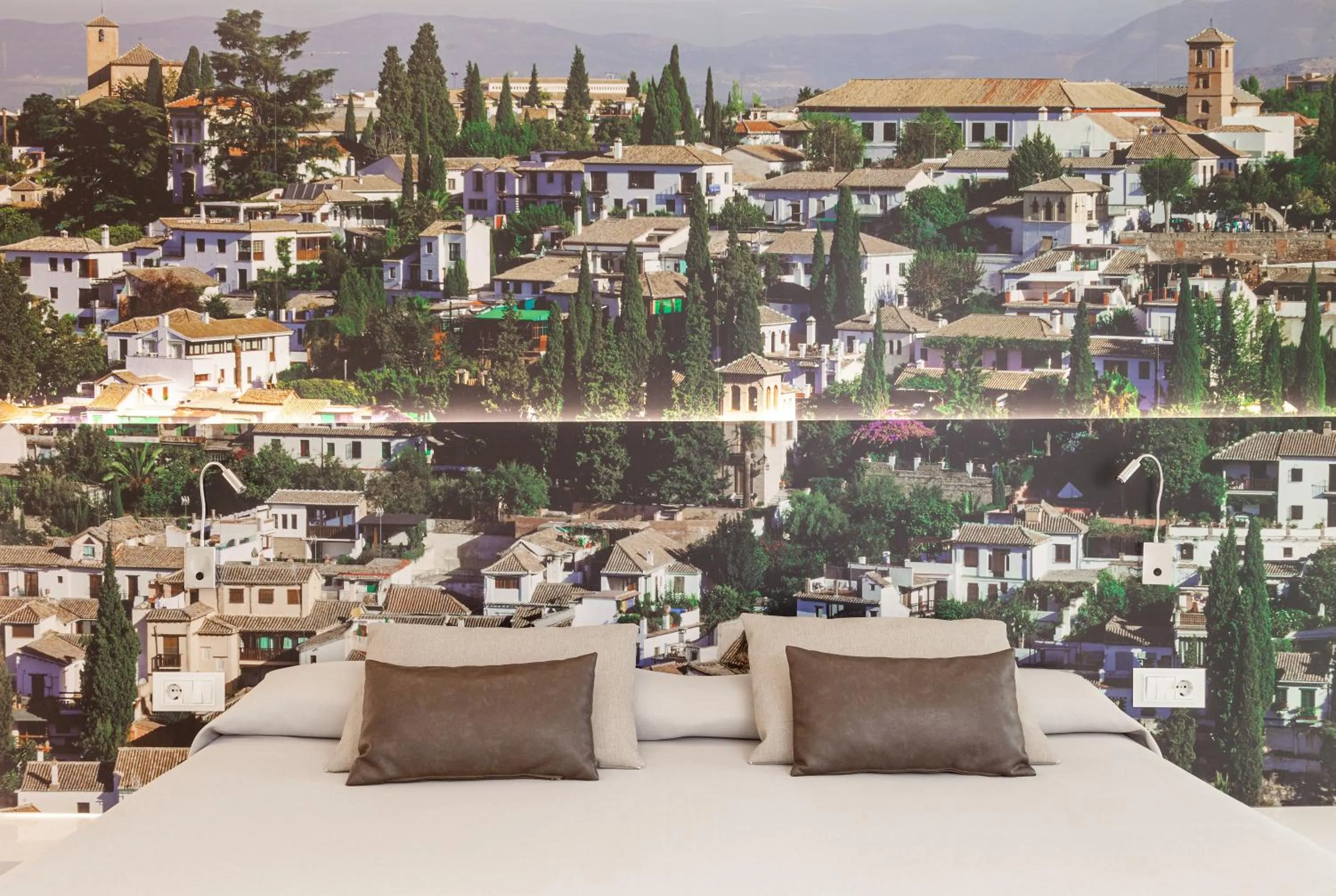 Bed in Hotel Maciá Granada Five Senses Rooms & Suites