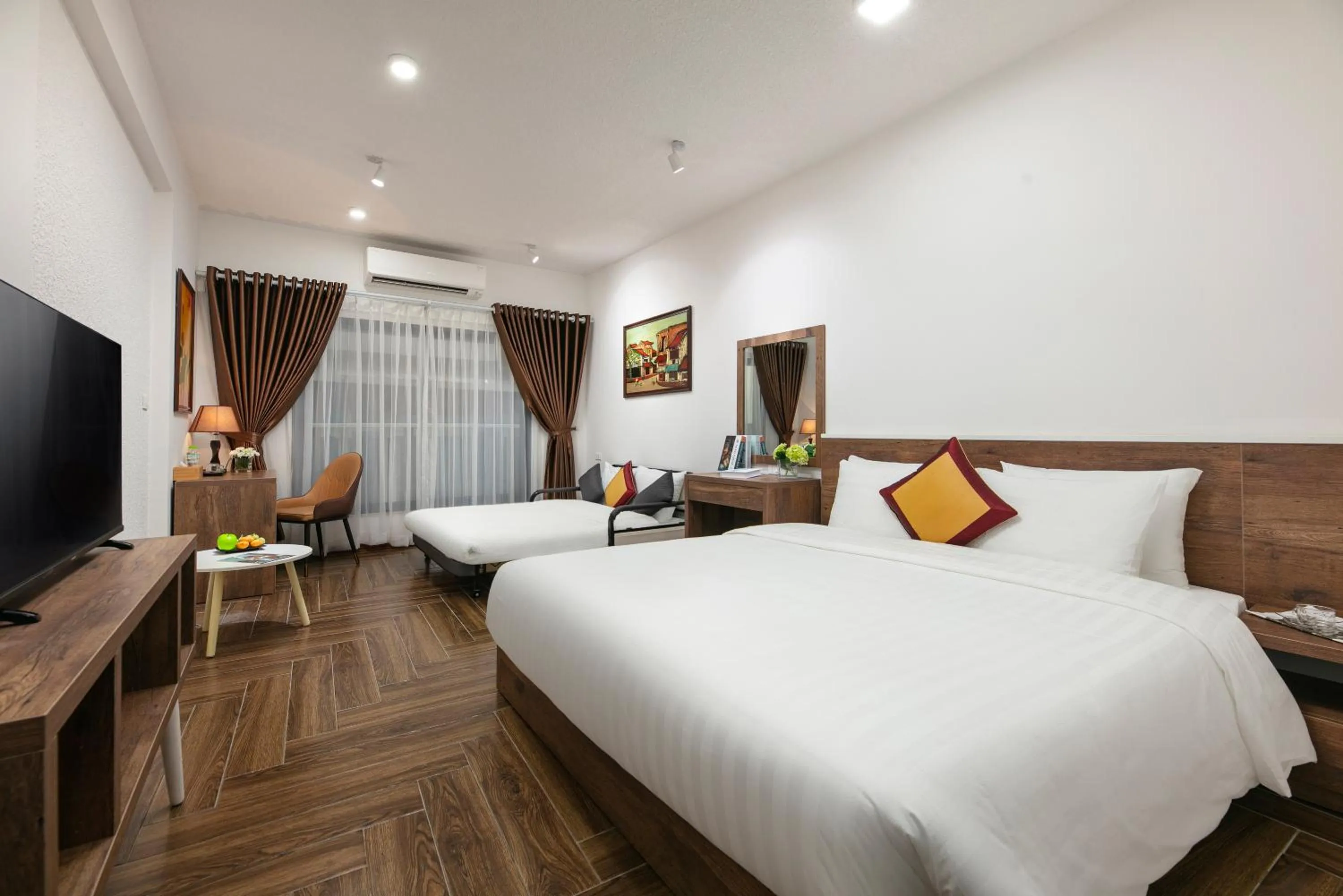 Living room, Bed in Hanoi Saga Hotel