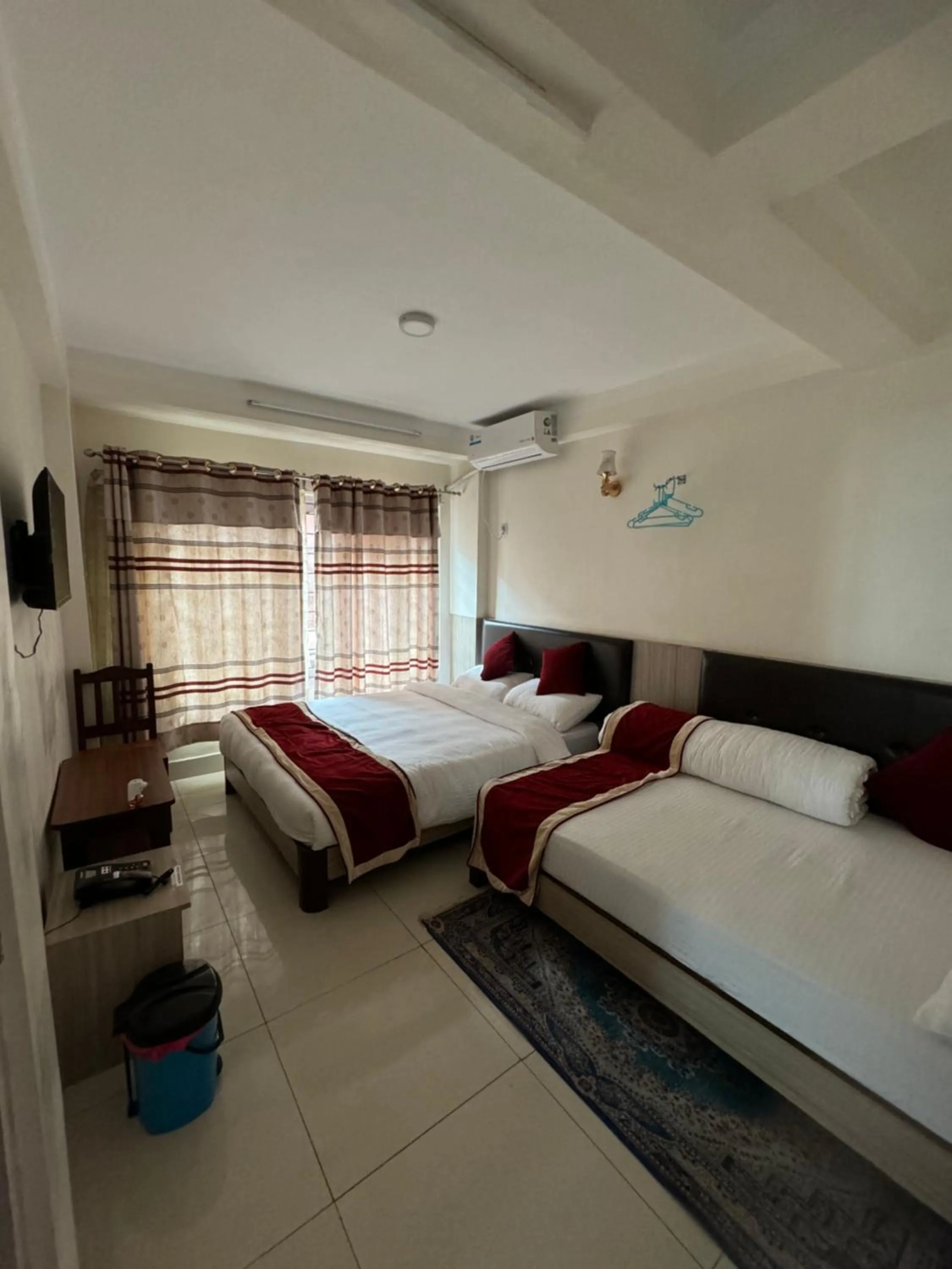 Bed in Om Bramha Hotel