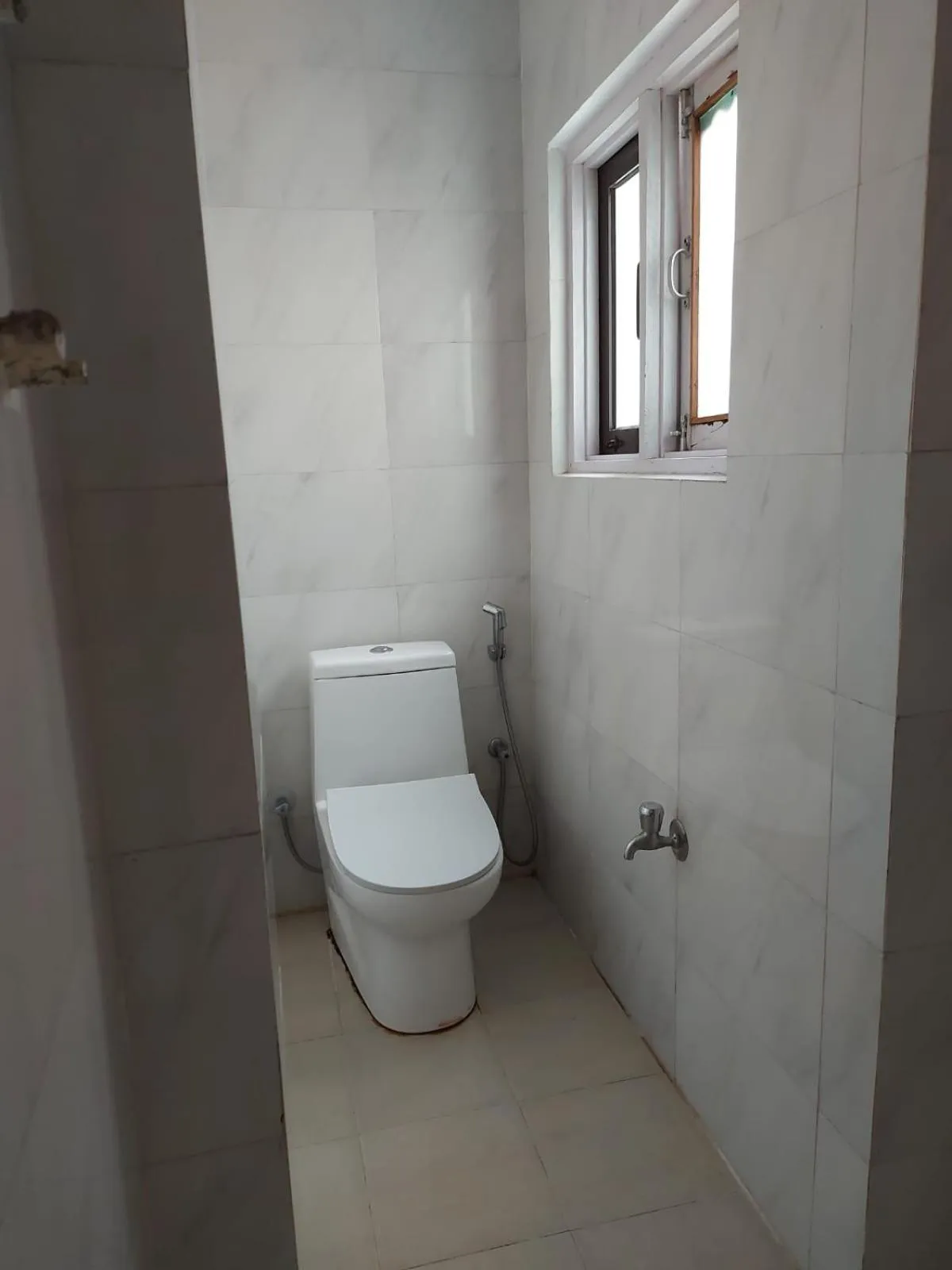 Toilet in Om Bramha Hotel