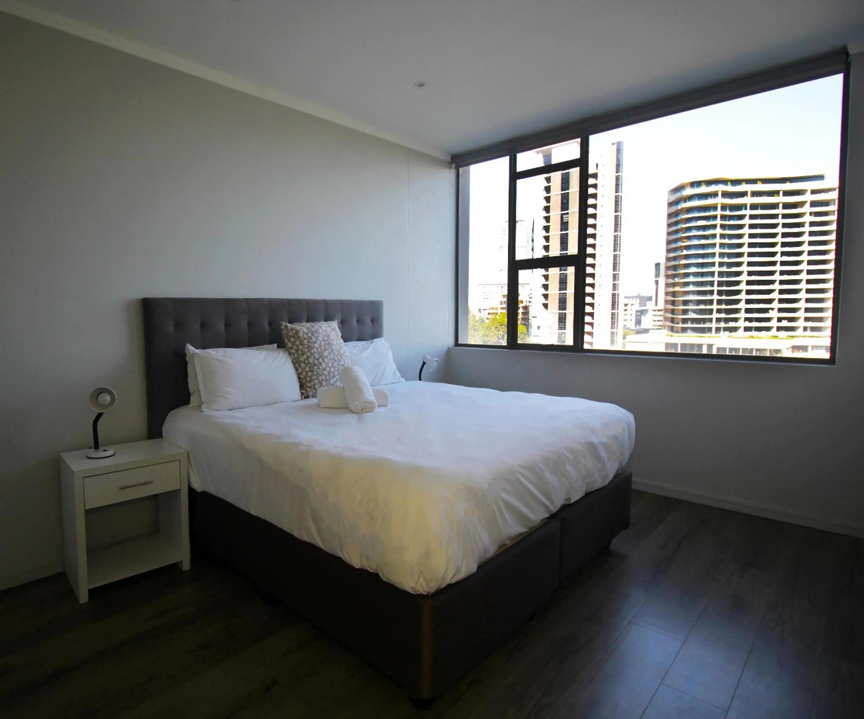 Bedroom, Bed in CGRSA Apartments Sandton