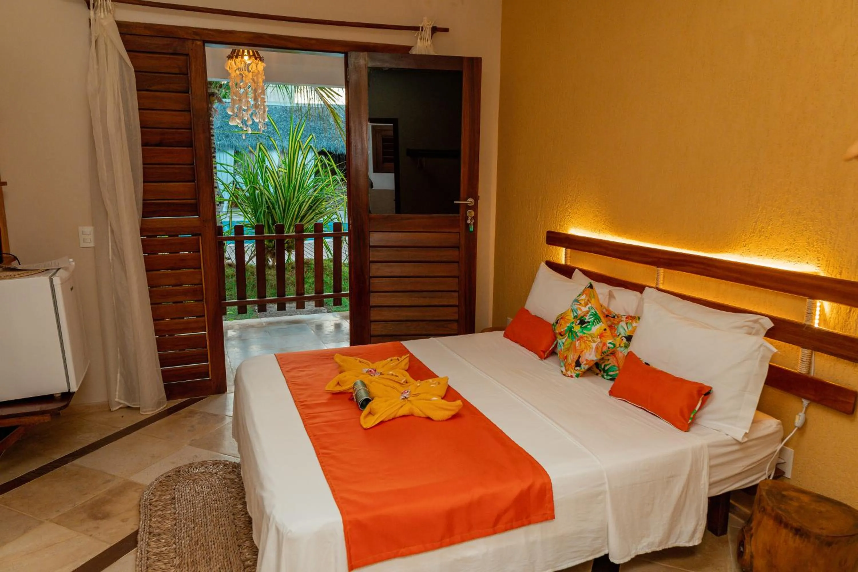 Bed in Camozen Resort & Spa