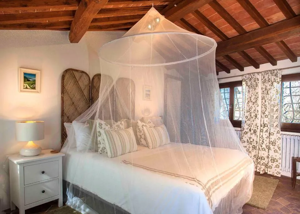 Bed in Tuscan Escape Luxury 2 bedroom apartment with pool