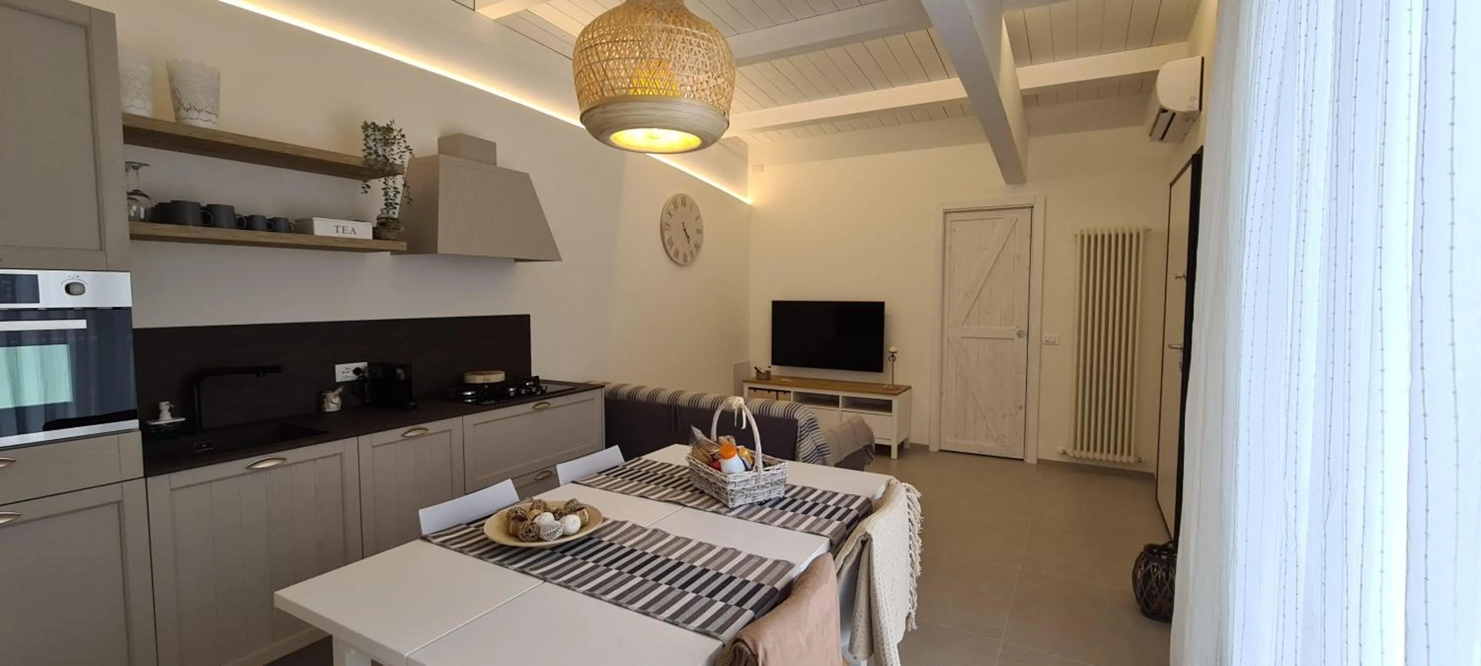 TV and multimedia in Appartamento Tra Cielo e Mare Cesenatico