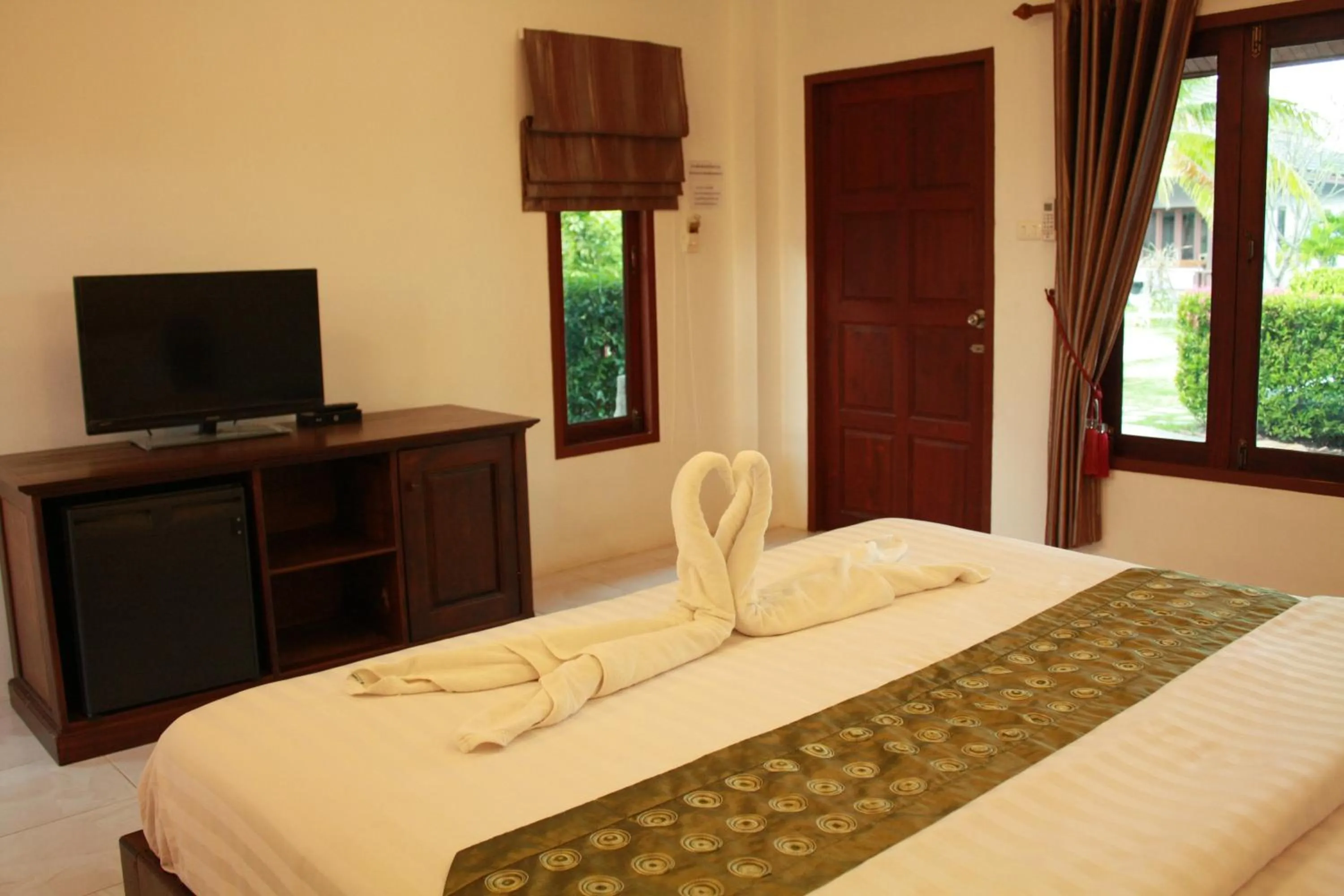 Photo of the whole room, Bed in Waterside Resort