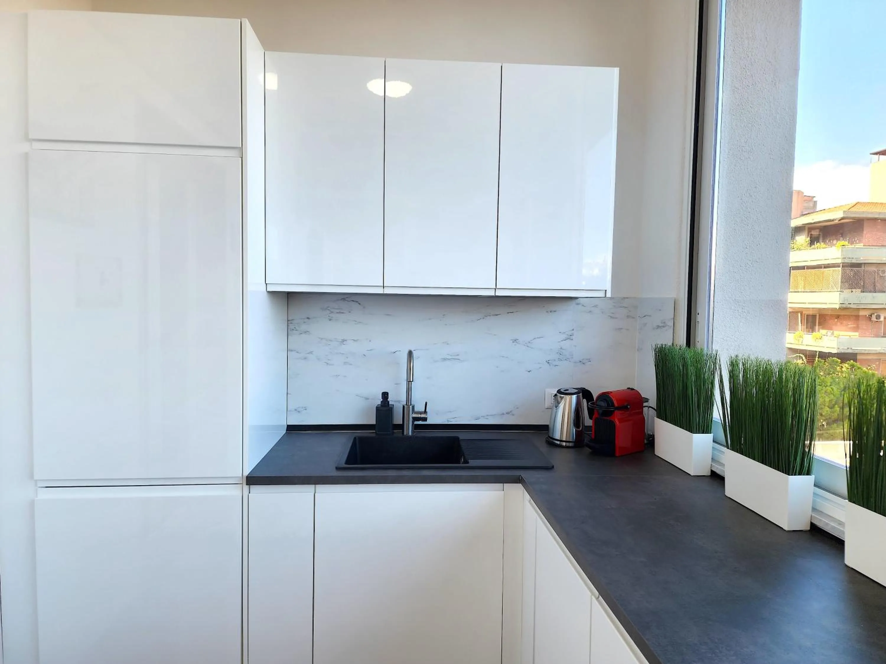Kitchen or kitchenette in BACARDI Lungomare - Modern apartment near the sea