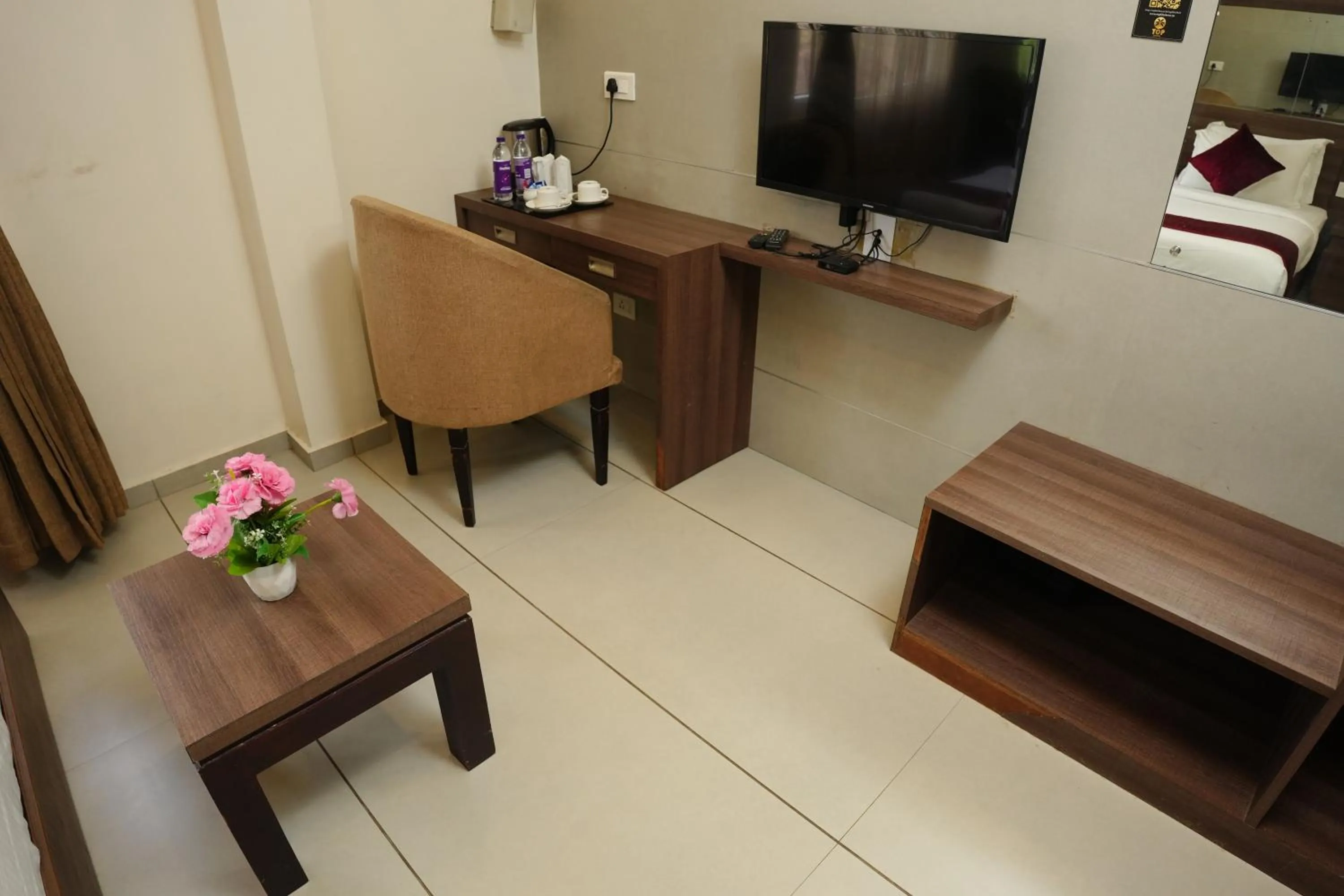 TV and multimedia in Hotel Palmyra Grand Inn - Kochi