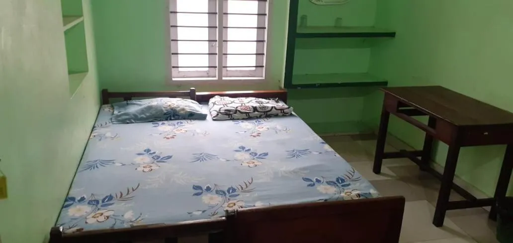 Bed in JEENA MOTEL