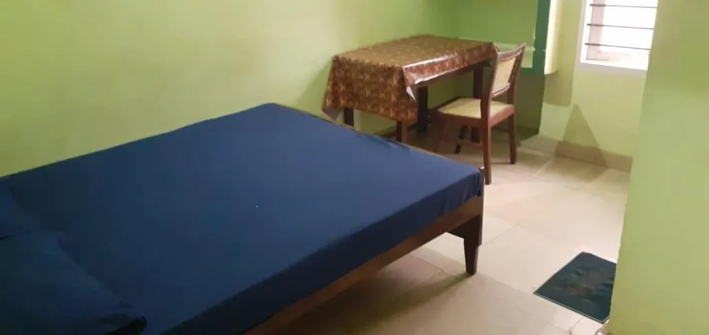 Bed in JEENA MOTEL