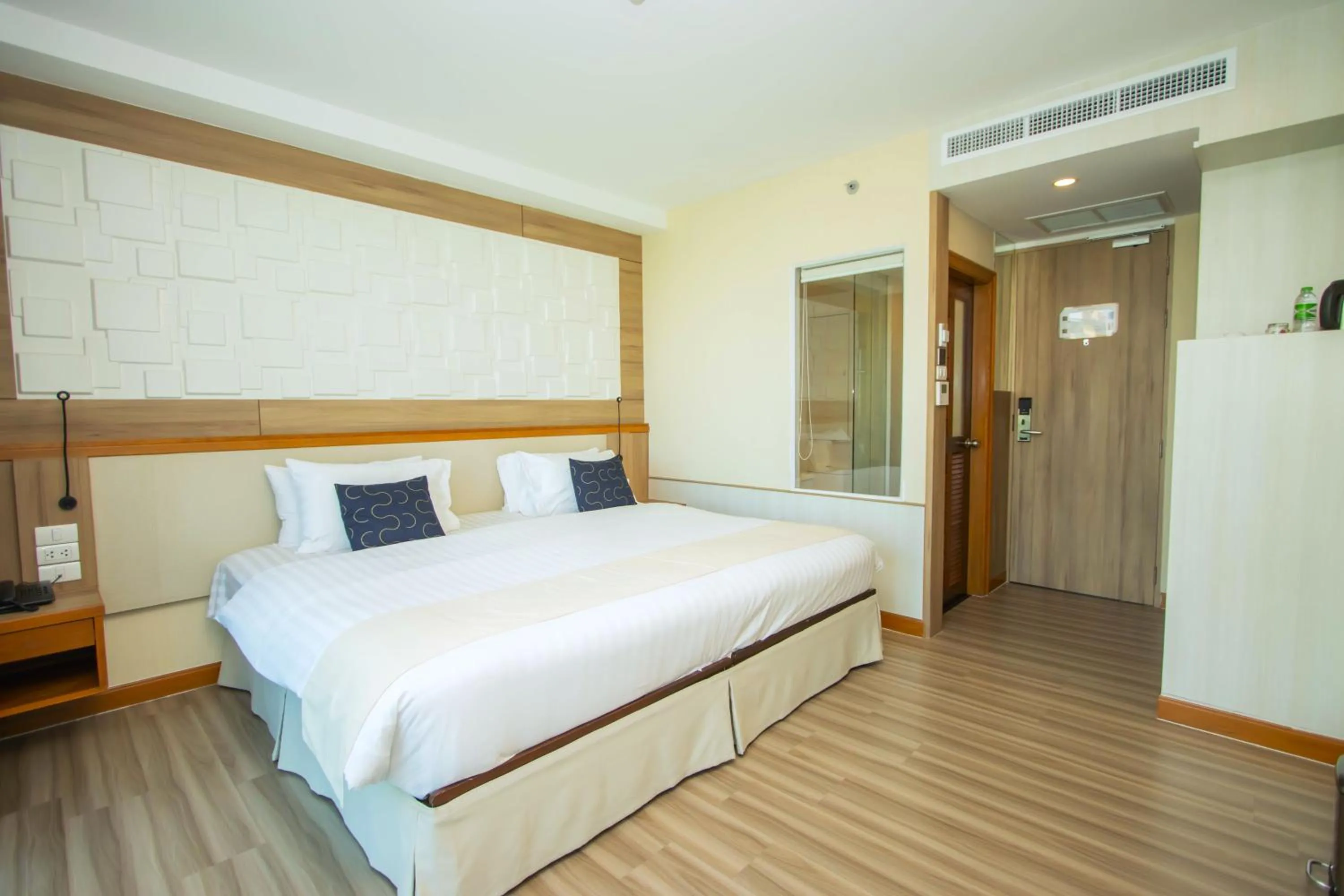 Bed in Sira Grande Hotel & Spa, Patong