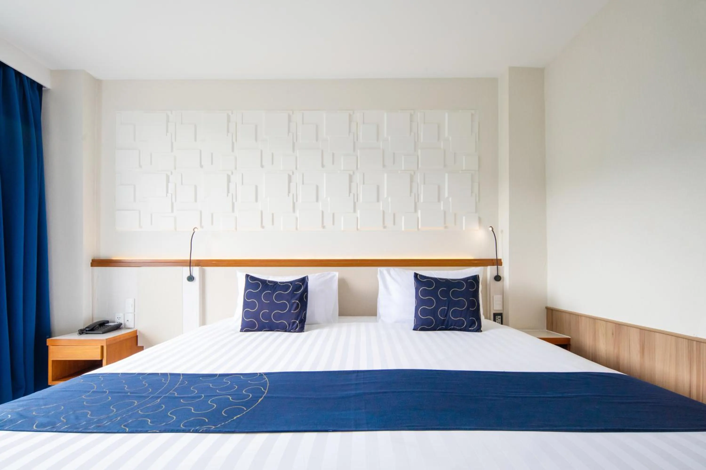 Bed in Sira Grande Hotel & Spa, Patong