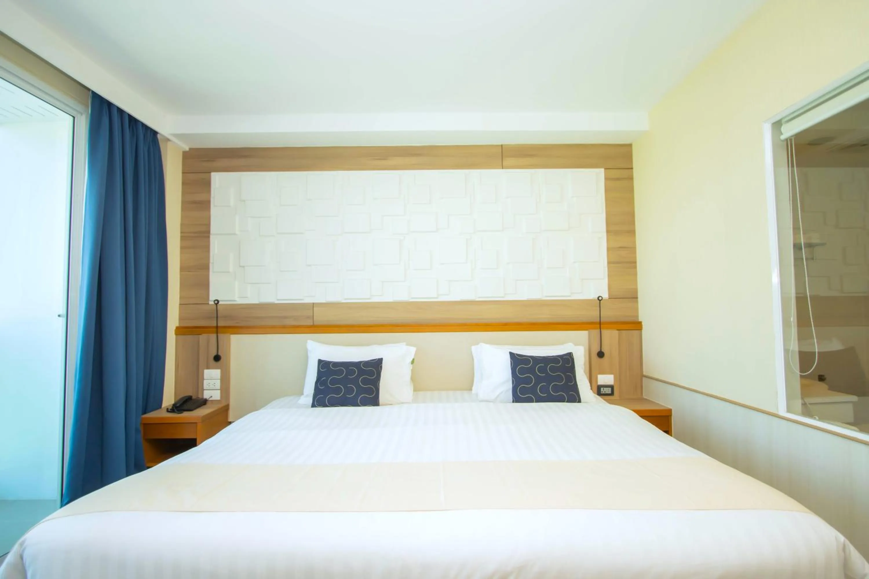 Bed in Sira Grande Hotel & Spa, Patong