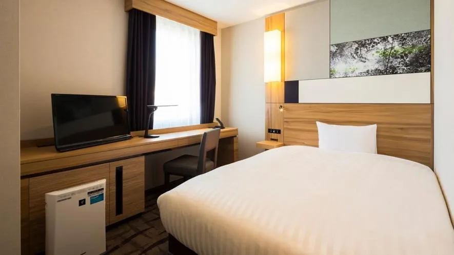 Bed in JR-East Hotel Mets Kokubunji