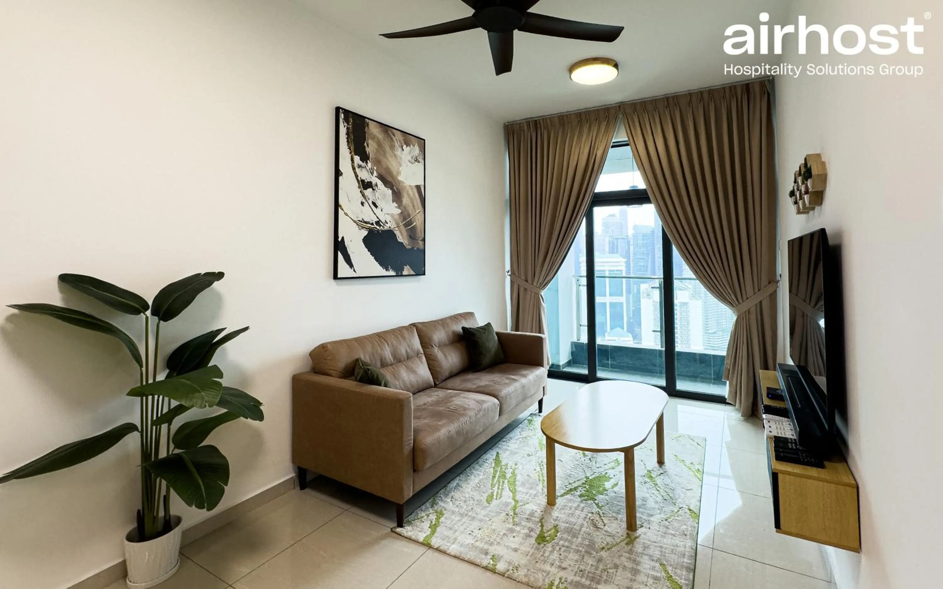 Living room in Legasi Kampung Baru by Airhost