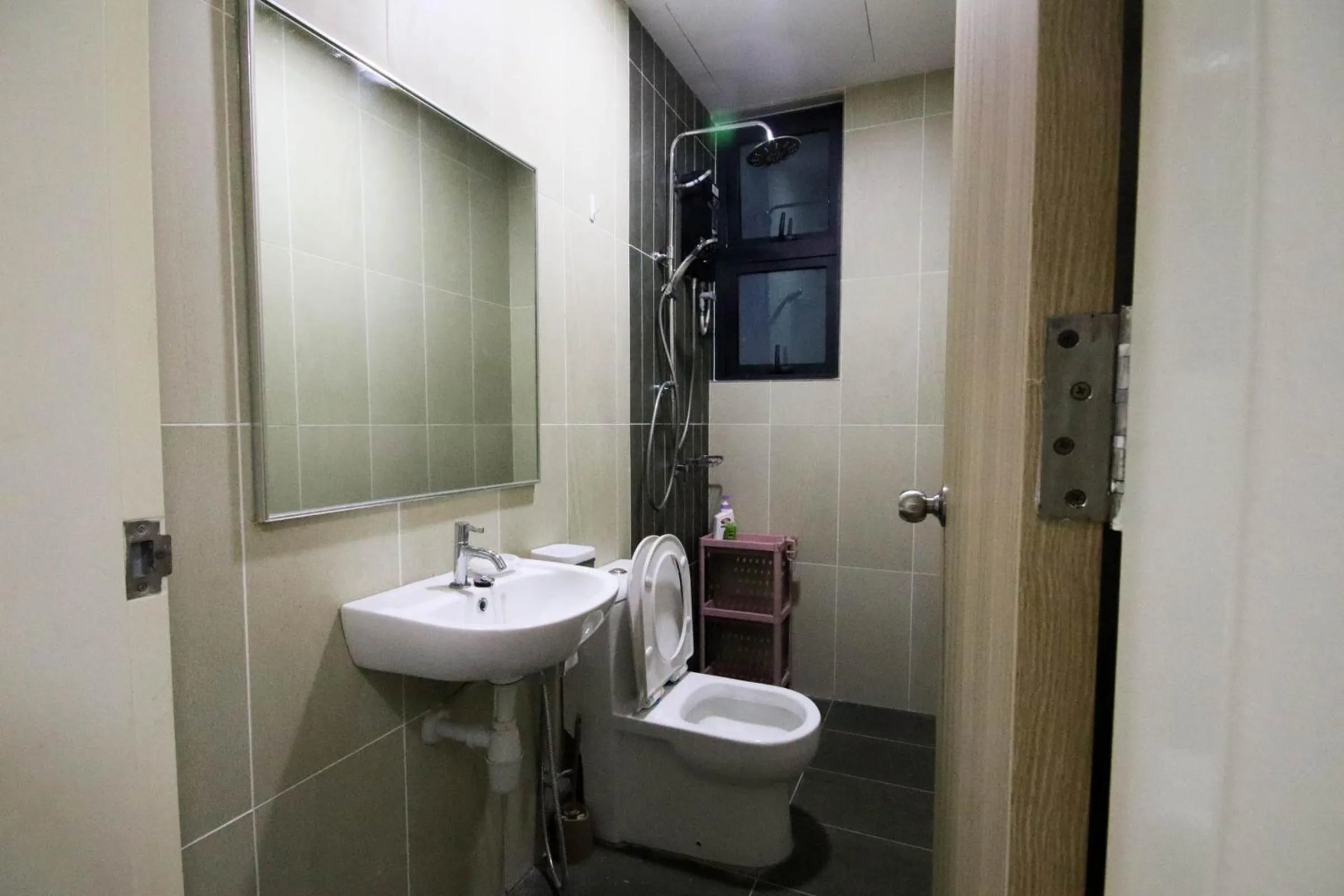 Bathroom in Legasi Kampung Baru by Airhost